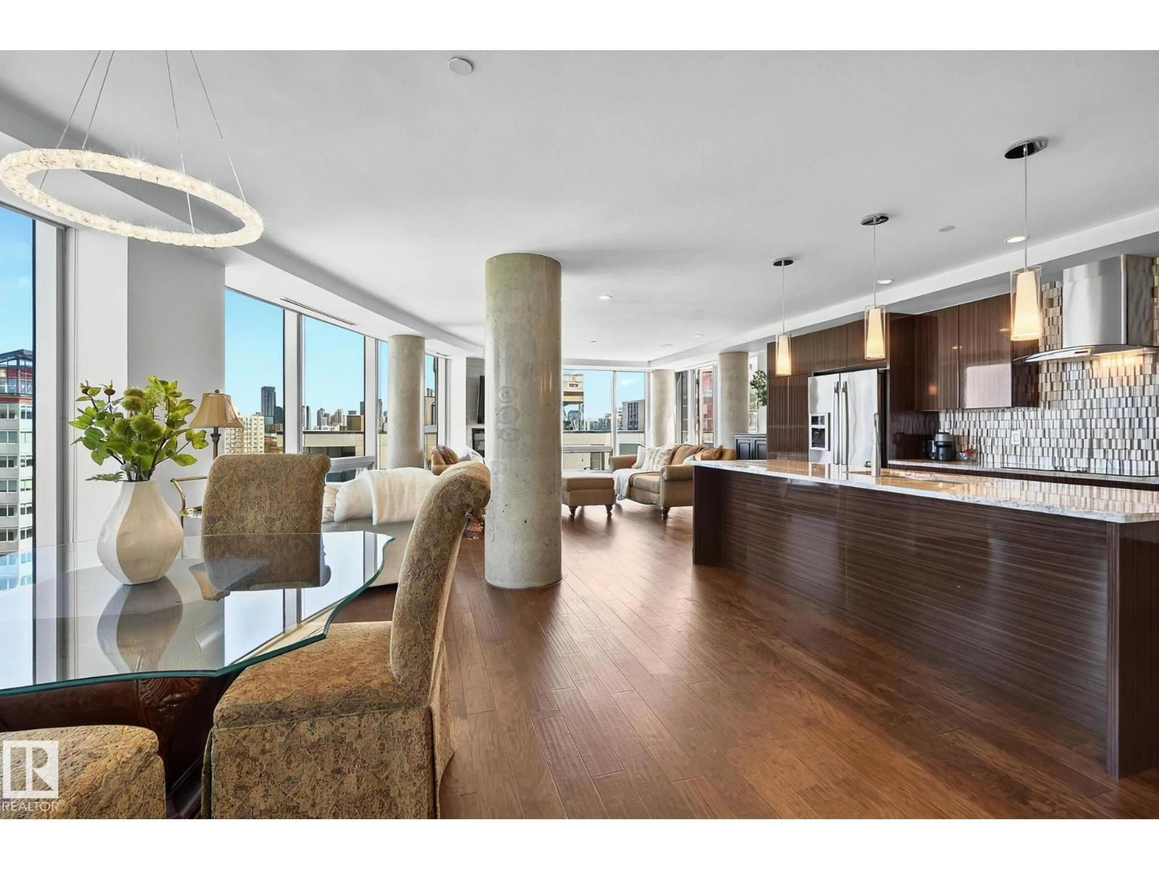 Open concept kitchen, wood/laminate floor for 1201 JASPER AV, Edmonton Alberta T5K0P1