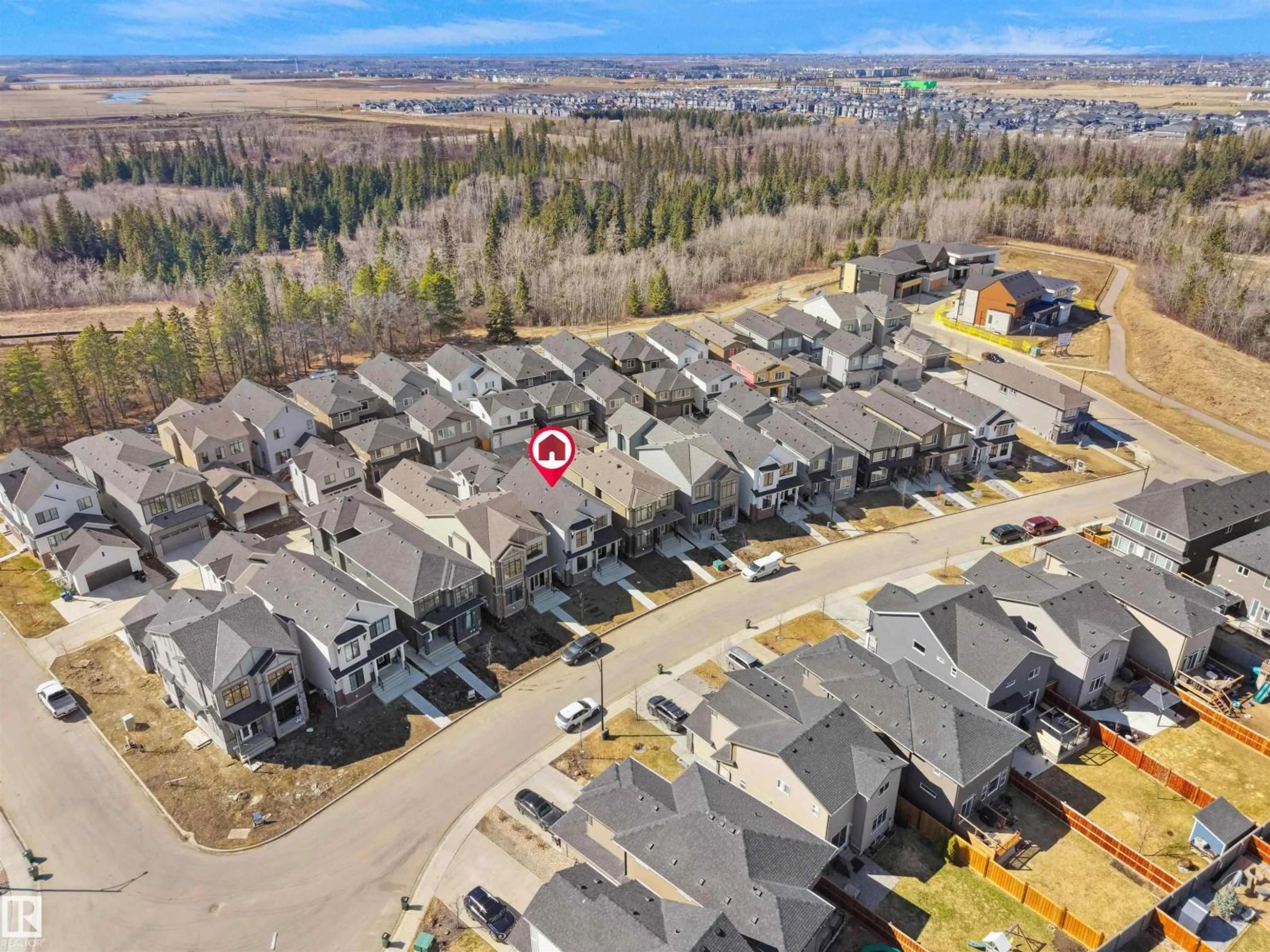 A pic from outside/outdoor area/front of a property/back of a property/a pic from drone, mountain view for 6722 CRAWFORD WY, Edmonton Alberta T6W4L8