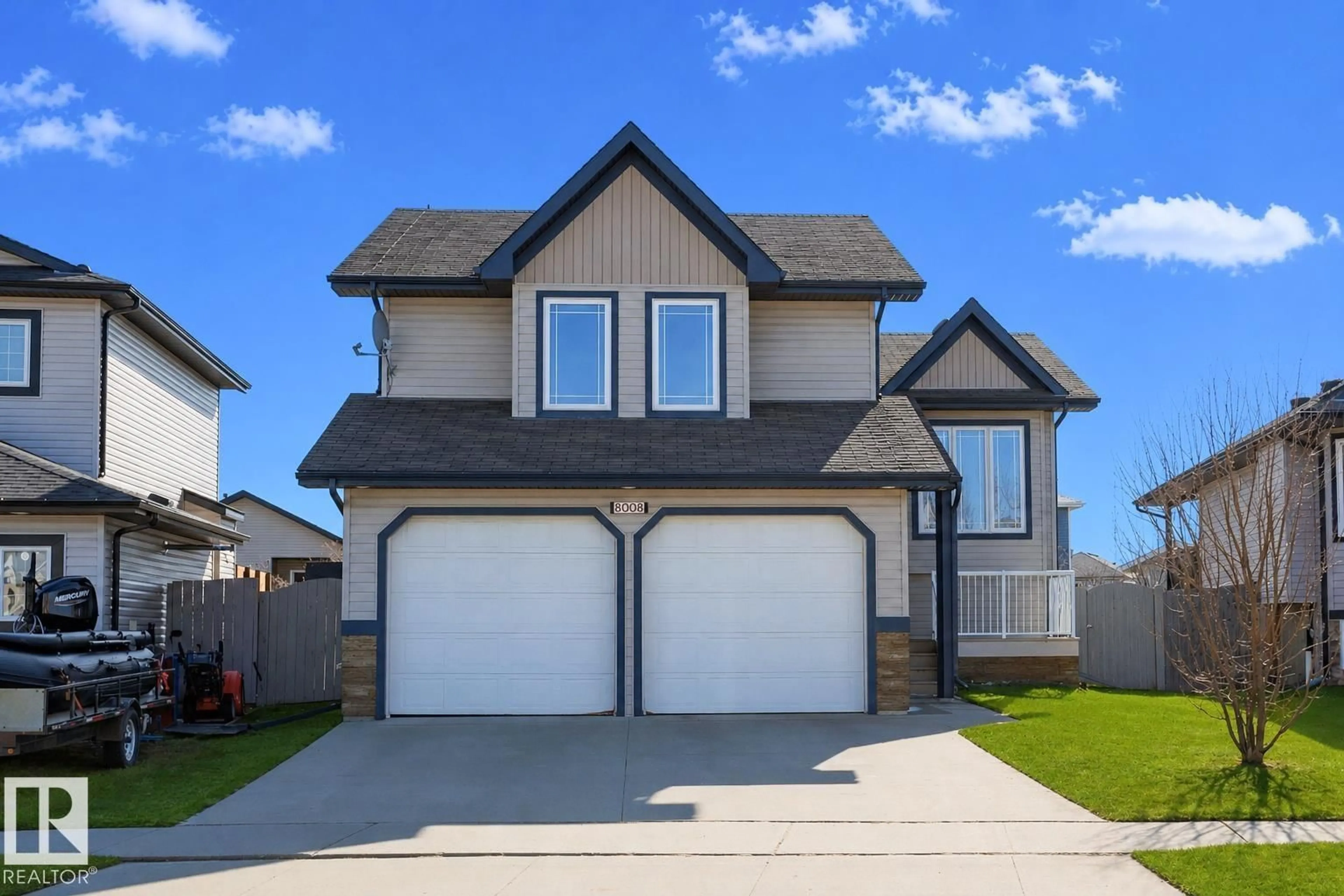 Home with vinyl exterior material, street for 8008 96 STREET, Morinville Alberta T8R1W1