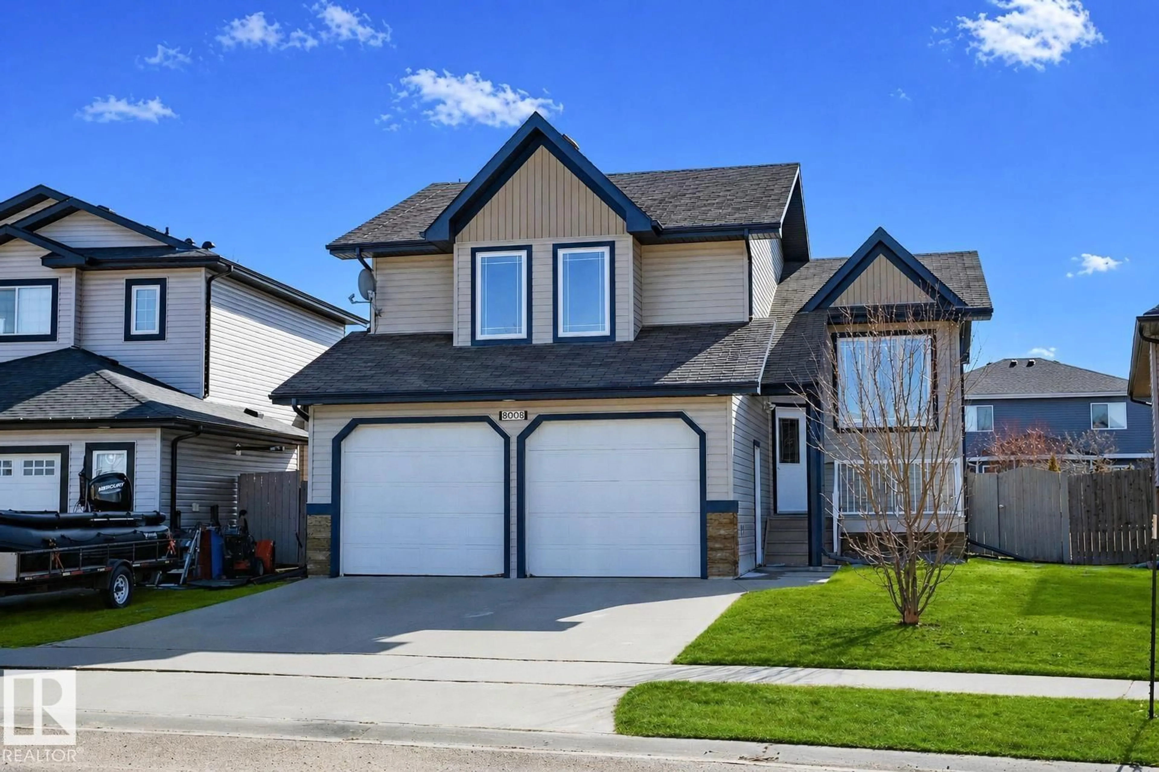 Home with vinyl exterior material, street for 8008 96 STREET, Morinville Alberta T8R1W1