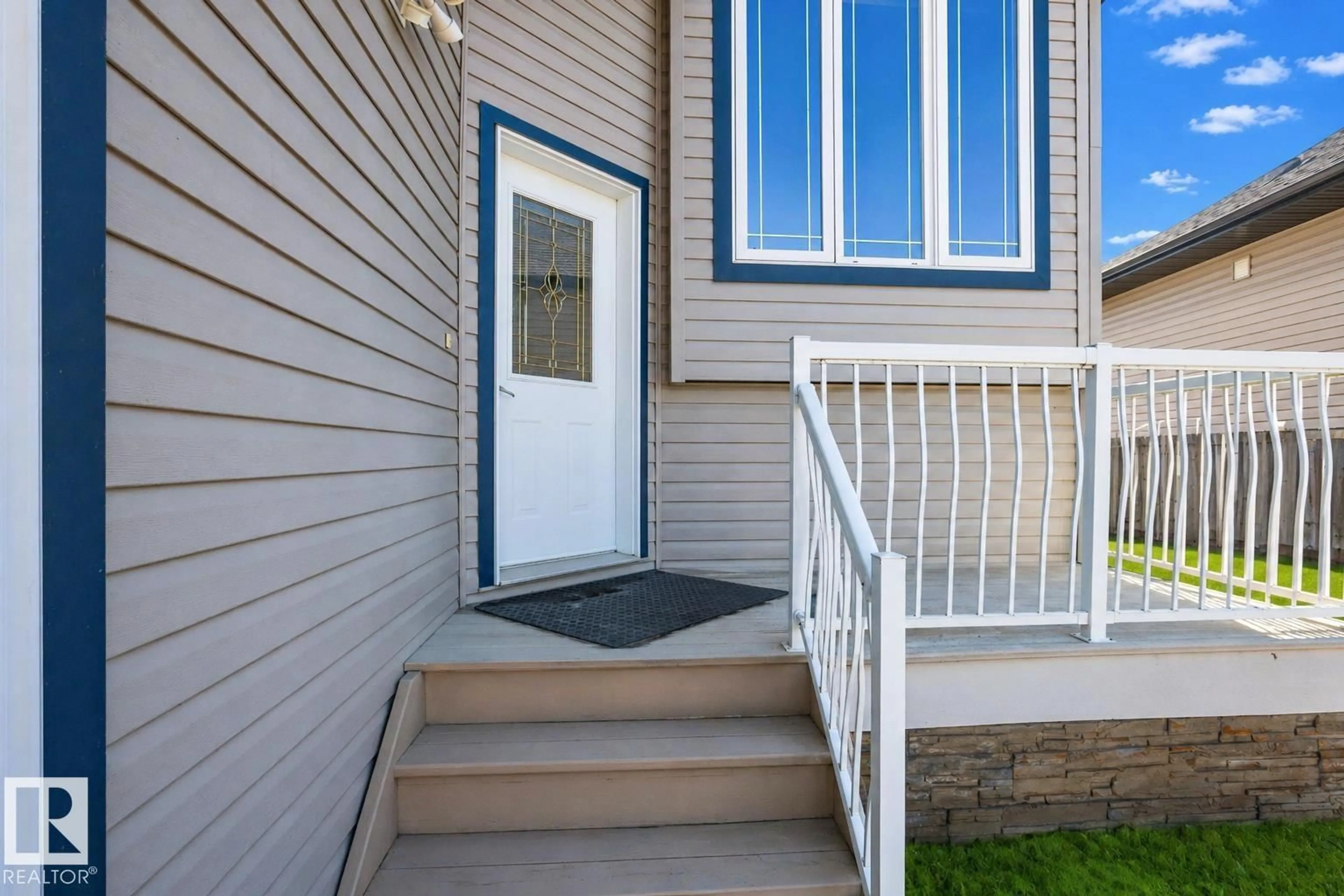 Home with vinyl exterior material, street for 8008 96 STREET, Morinville Alberta T8R1W1