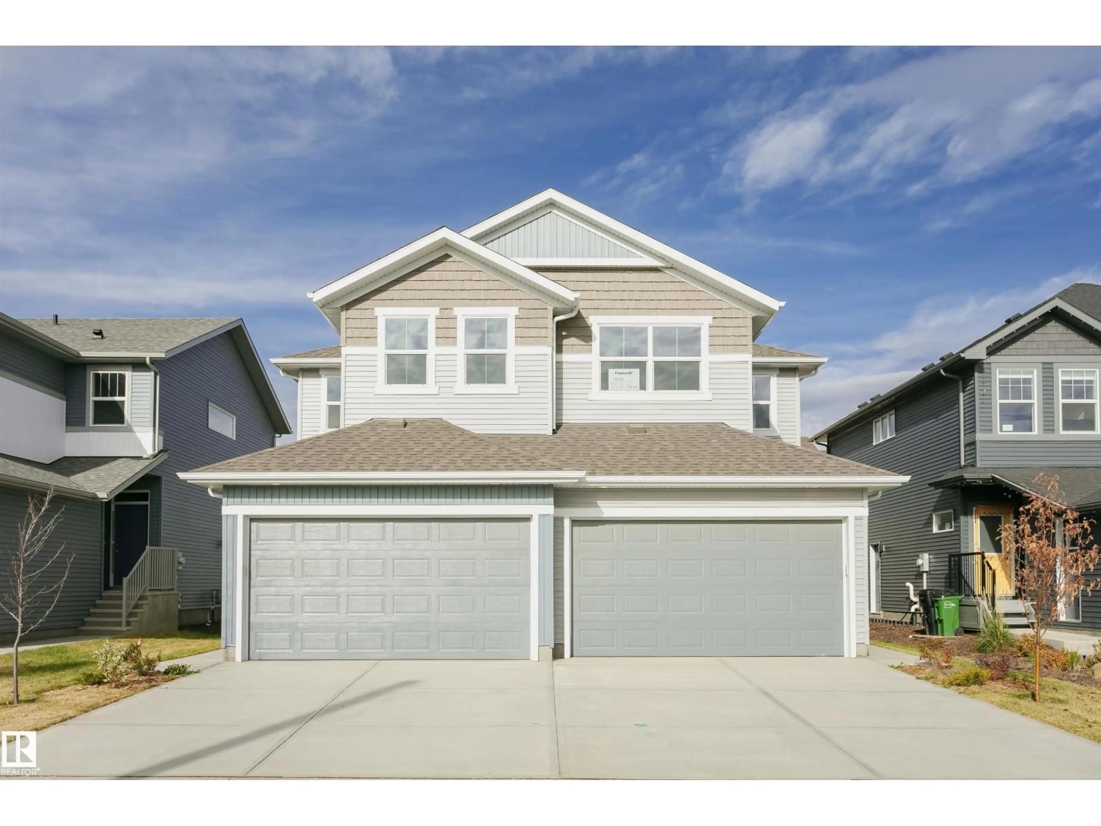 Home with vinyl exterior material, street for 2518 151A AV, Edmonton Alberta T5Y3Z2