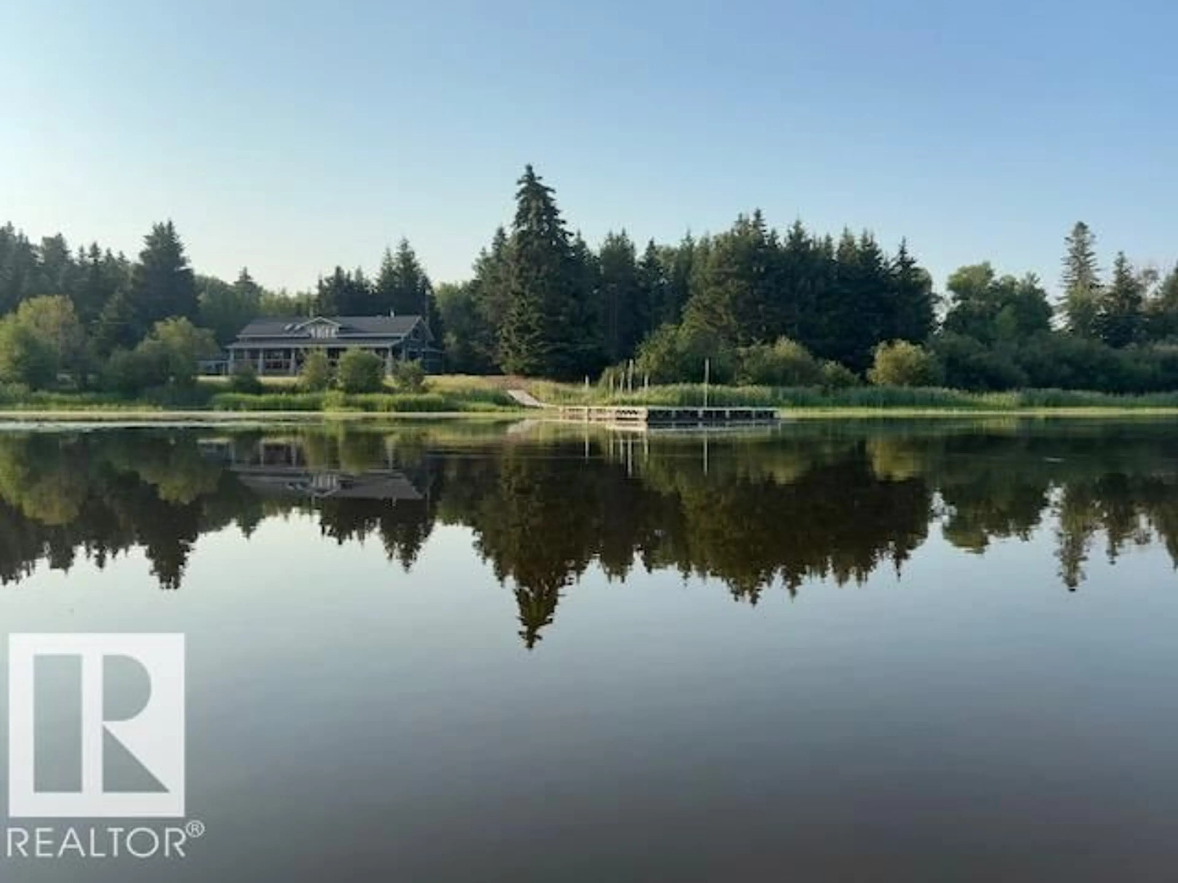 A pic from outside/outdoor area/front of a property/back of a property/a pic from drone, water/lake/river/ocean view for 63102 RR 415, Rural Bonnyville M.D. Alberta T9M1P2