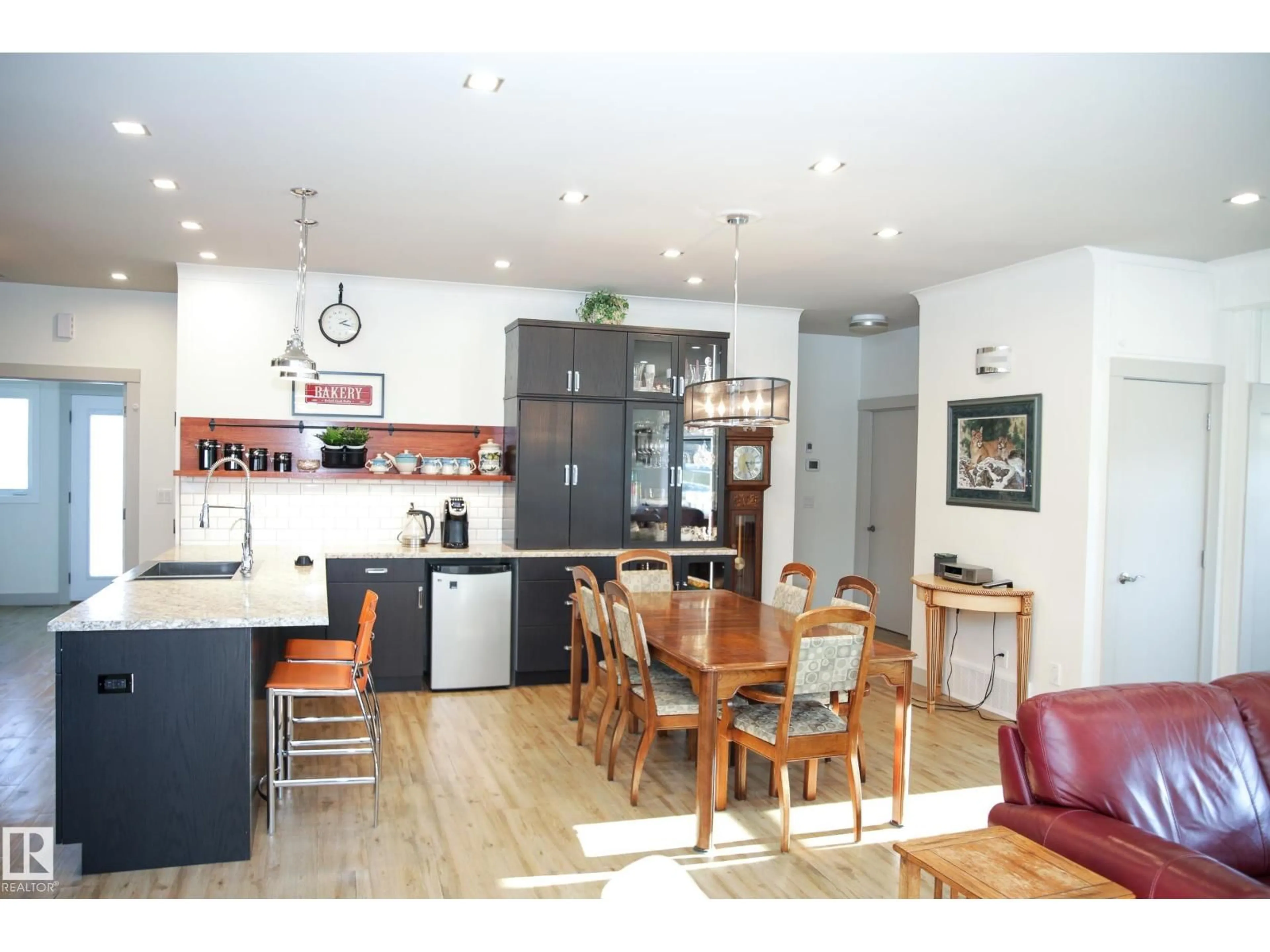 Open concept kitchen, wood/laminate floor for 116 MAIN ST, Kingman Alberta T0B2M0