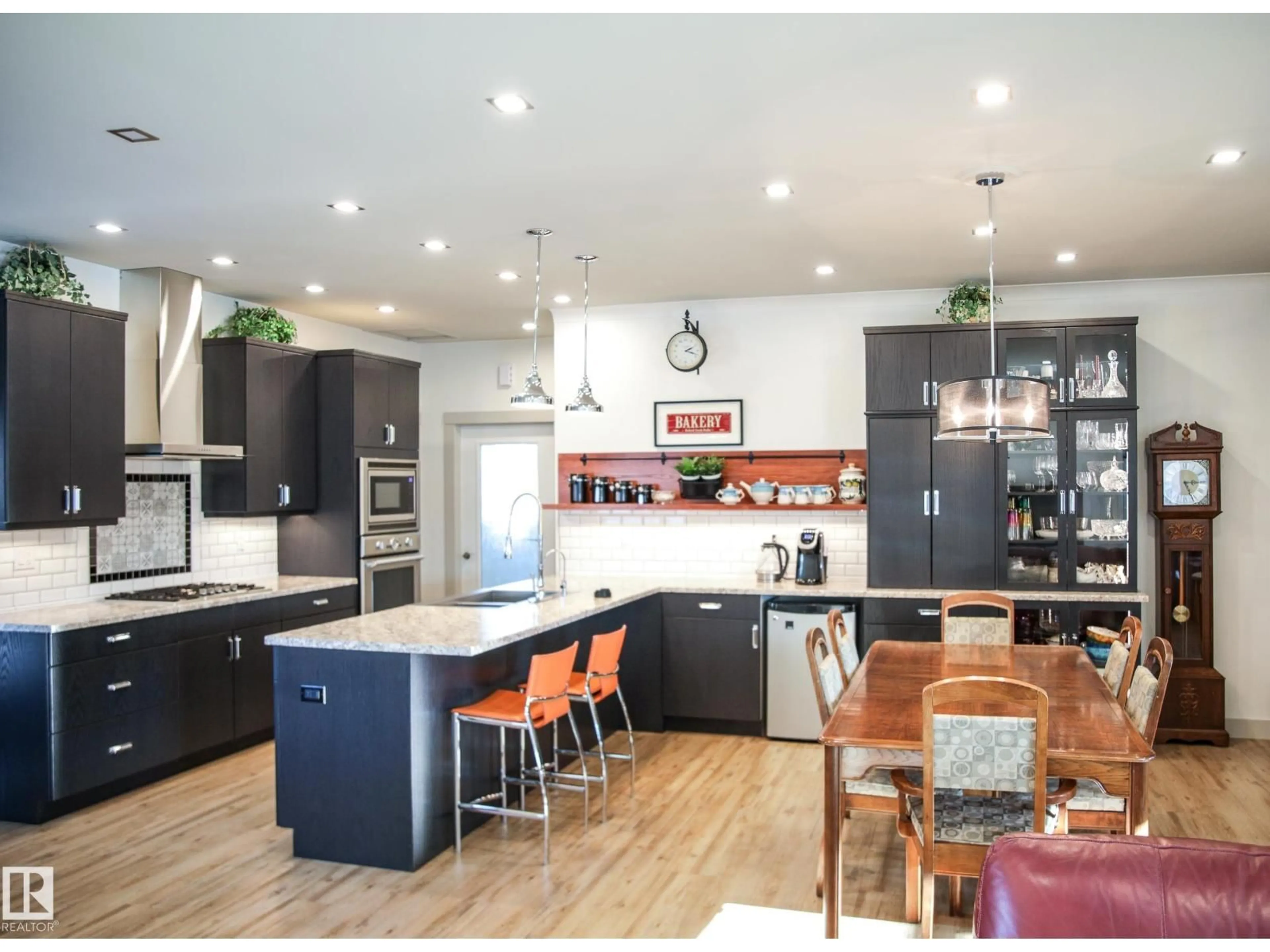 Open concept kitchen, wood/laminate floor for 116 MAIN ST, Kingman Alberta T0B2M0