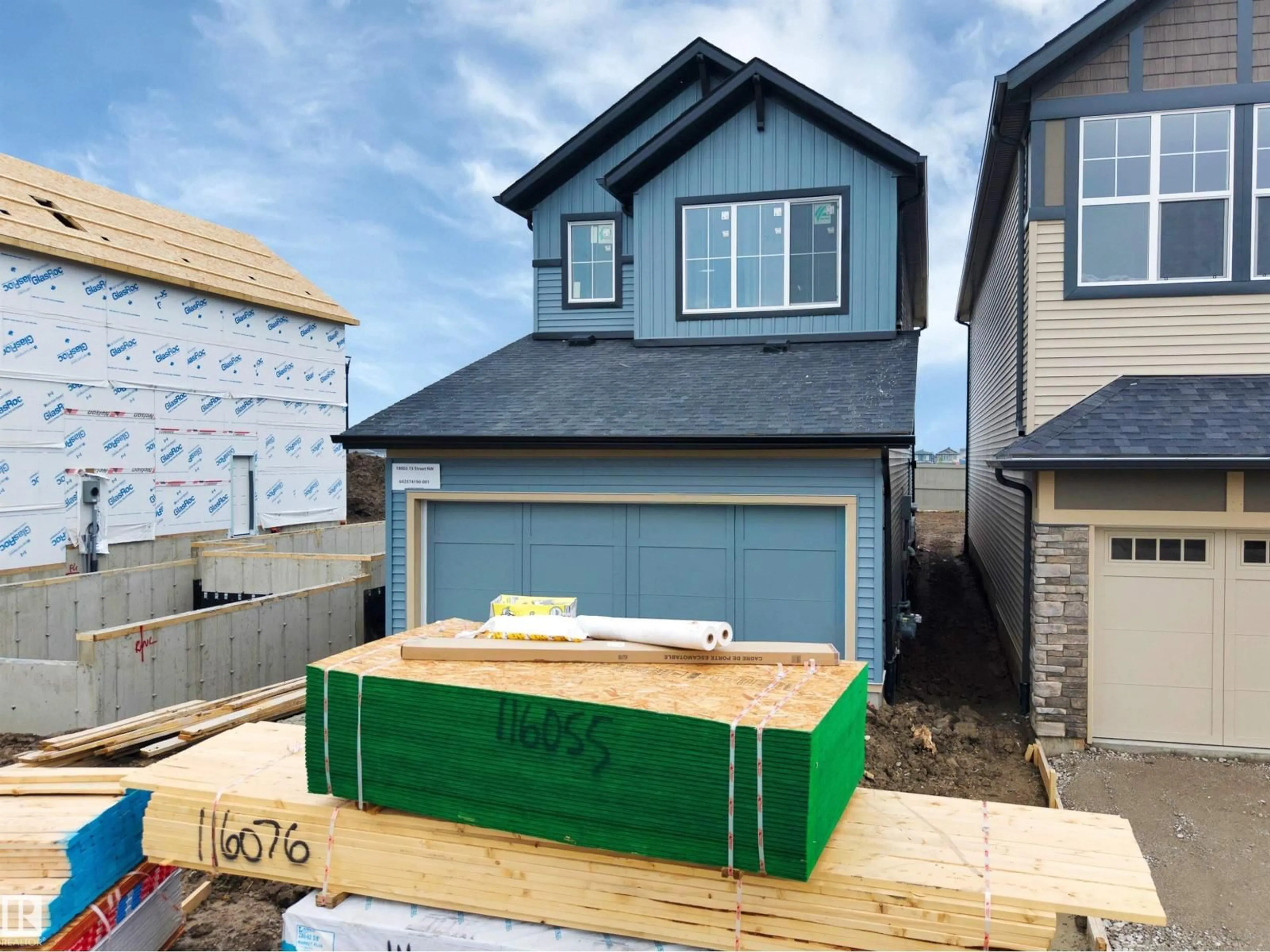 Home with vinyl exterior material, street for 18003 73 ST NW, Edmonton Alberta T5Z0W7
