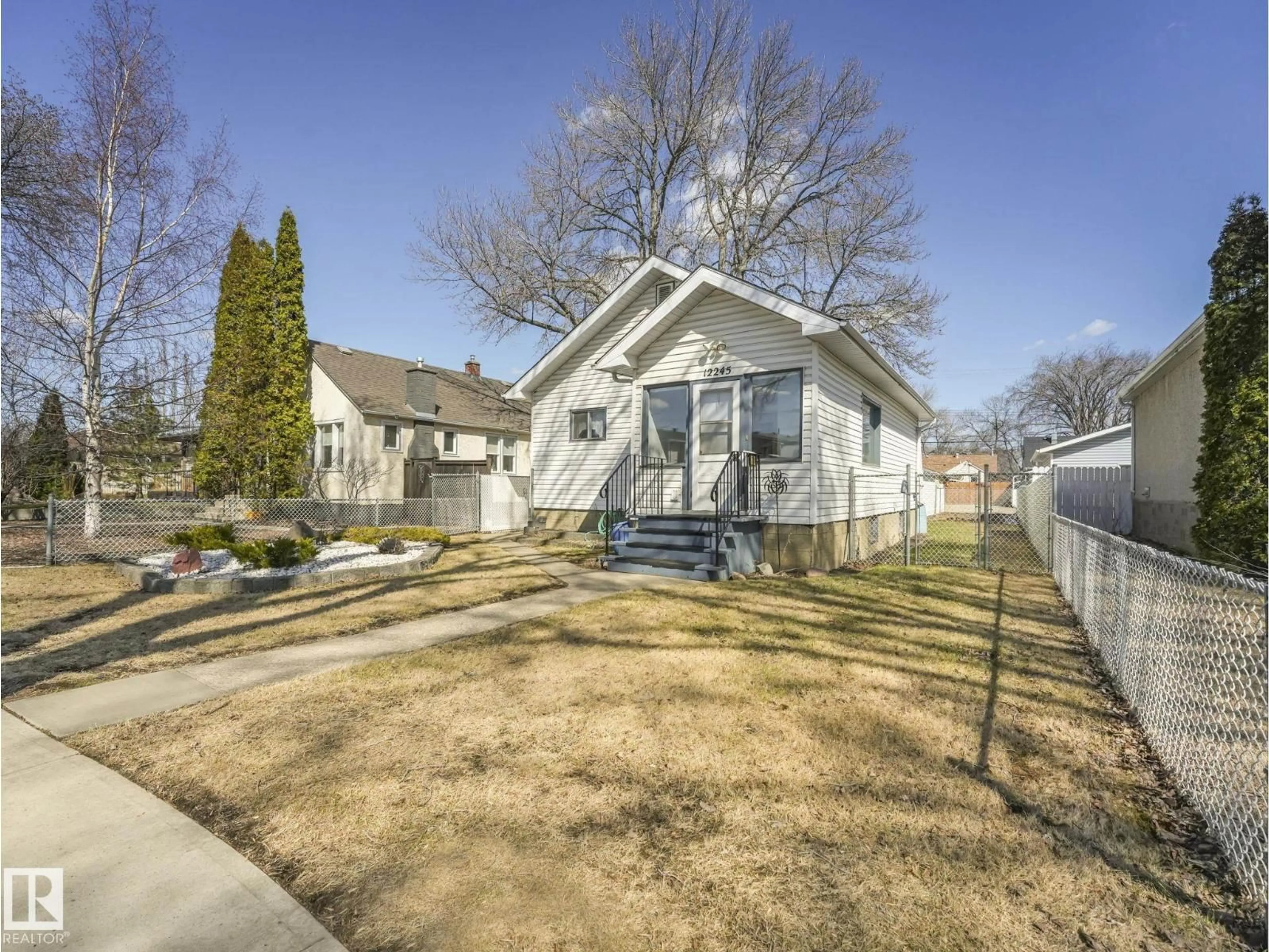 A pic from outside/outdoor area/front of a property/back of a property/a pic from drone, street for 12245 96 ST, Edmonton Alberta T5G1W2