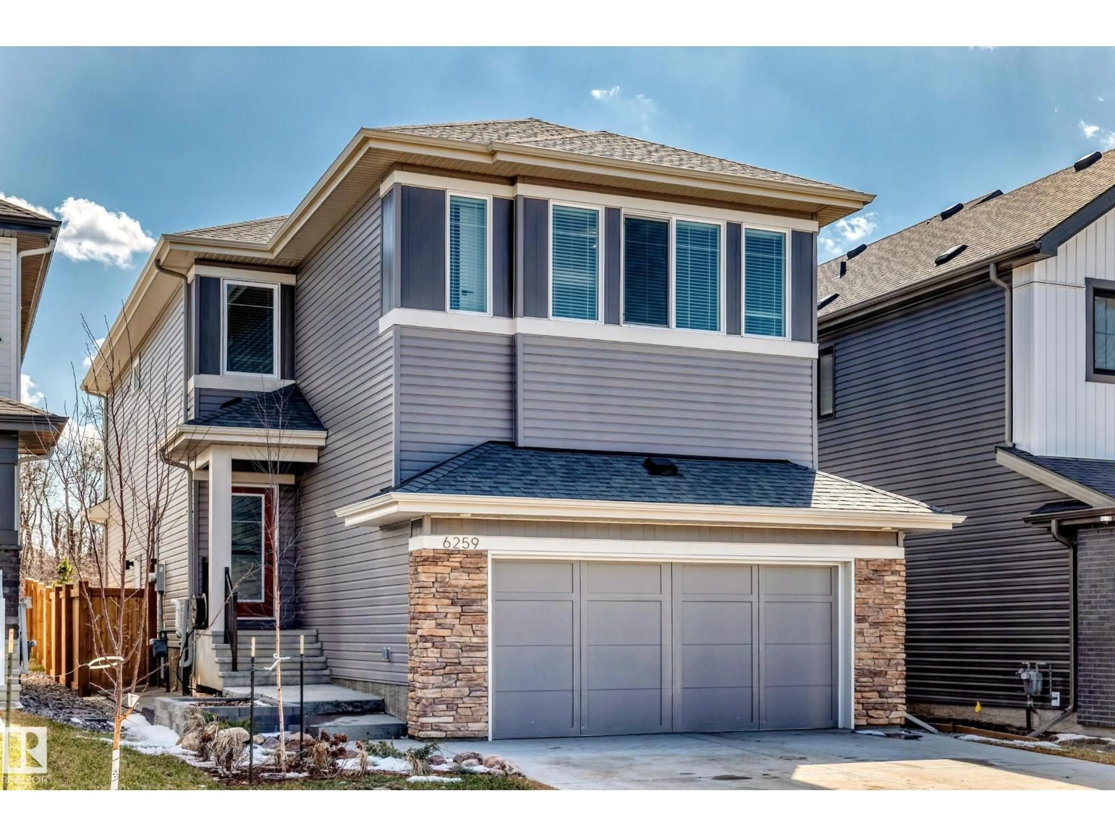 Home with brick exterior material, street for 6259 175 AV, Edmonton Alberta T5Y0T4