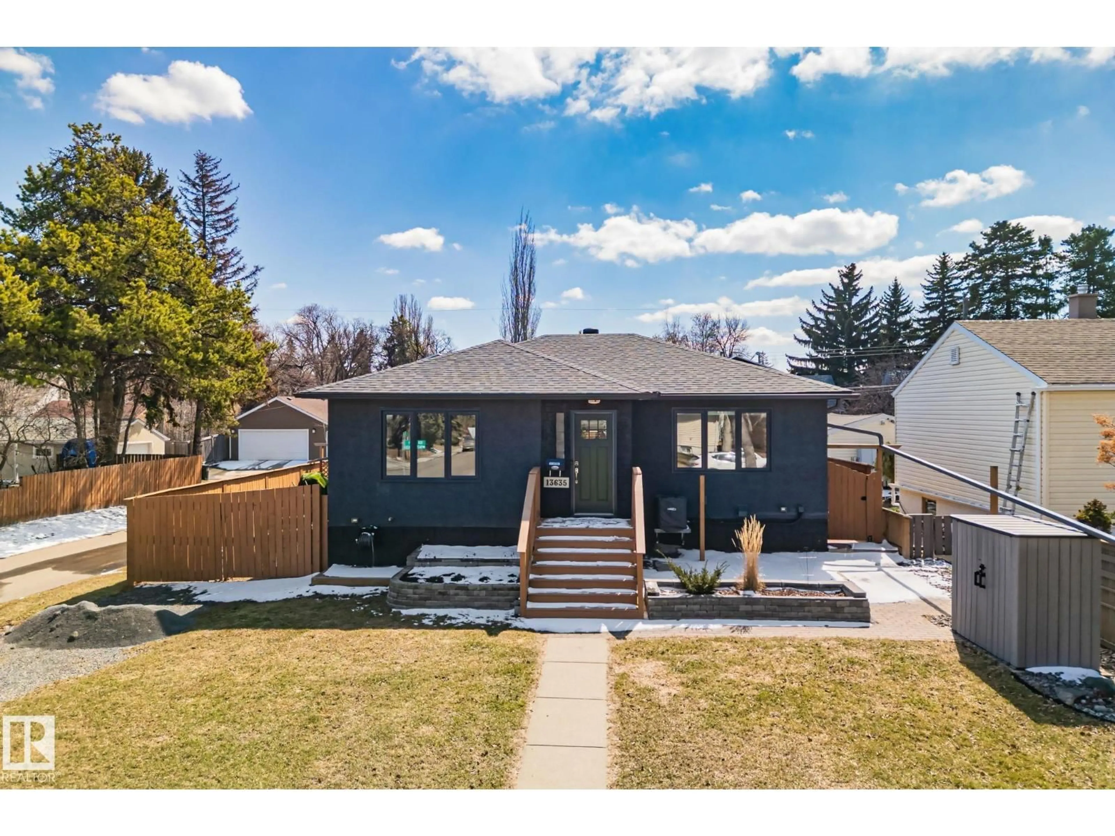 Home with vinyl exterior material, street for NW - 13635 108 AV, Edmonton Alberta T5M2C7
