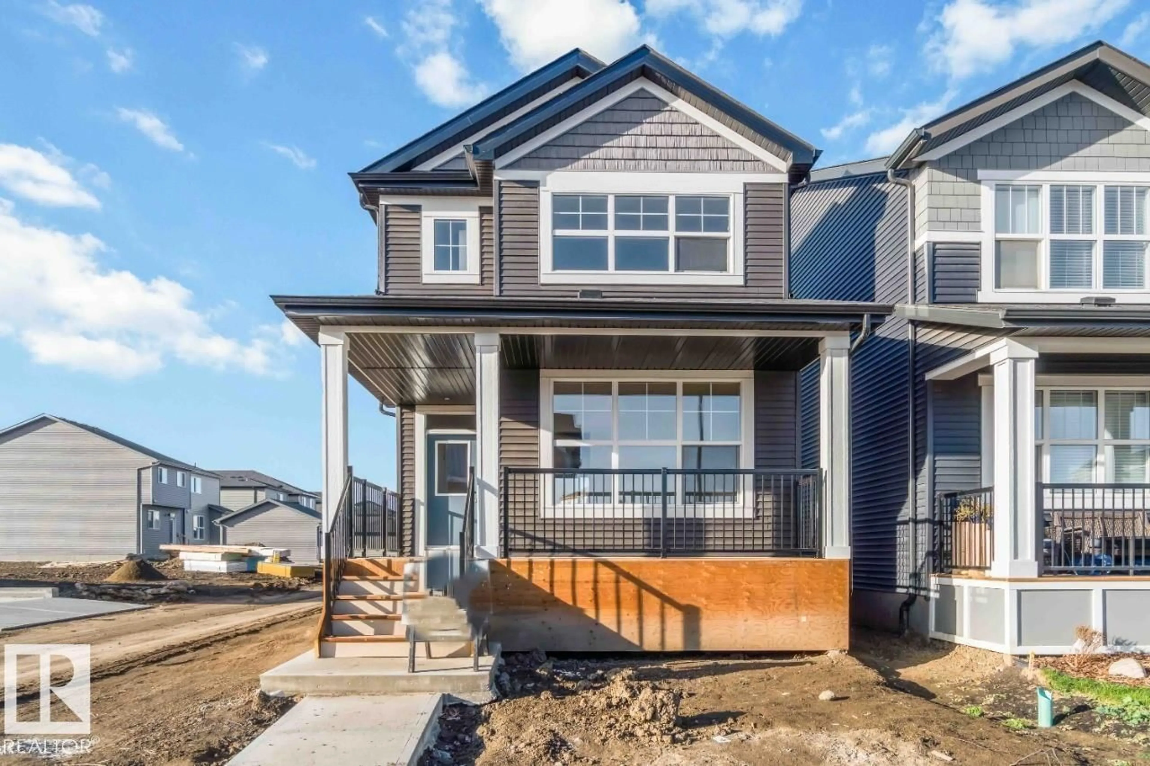 Home with vinyl exterior material, street for 7116 50A AVE, Beaumont Alberta T4X3E5