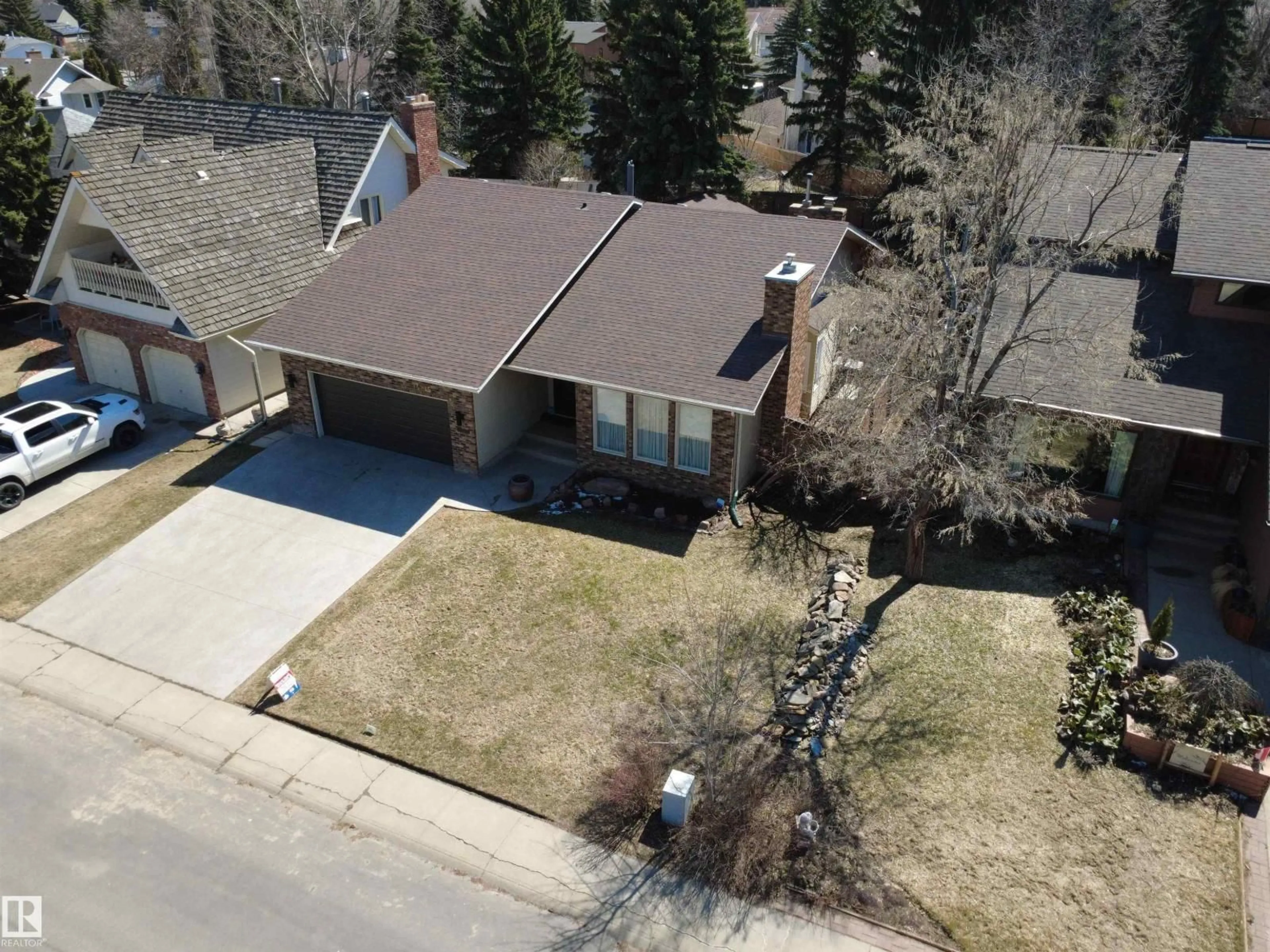 A pic from outside/outdoor area/front of a property/back of a property/a pic from drone, street for 15215 49 AV, Edmonton Alberta T6H5P2