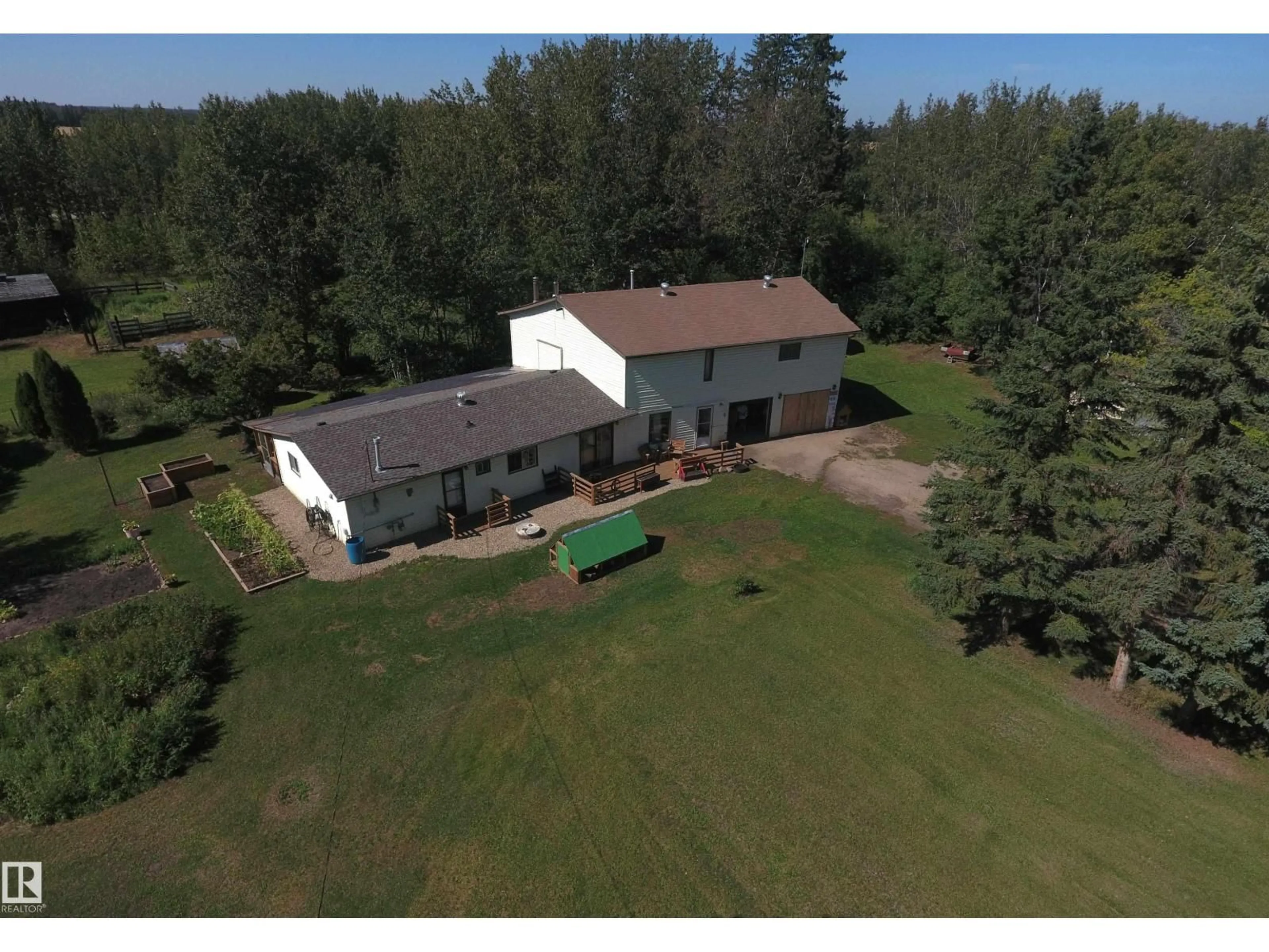 A pic from outside/outdoor area/front of a property/back of a property/a pic from drone, building for 2 - 23429 TWP RD 584, Rural Westlock County Alberta T0G1L0