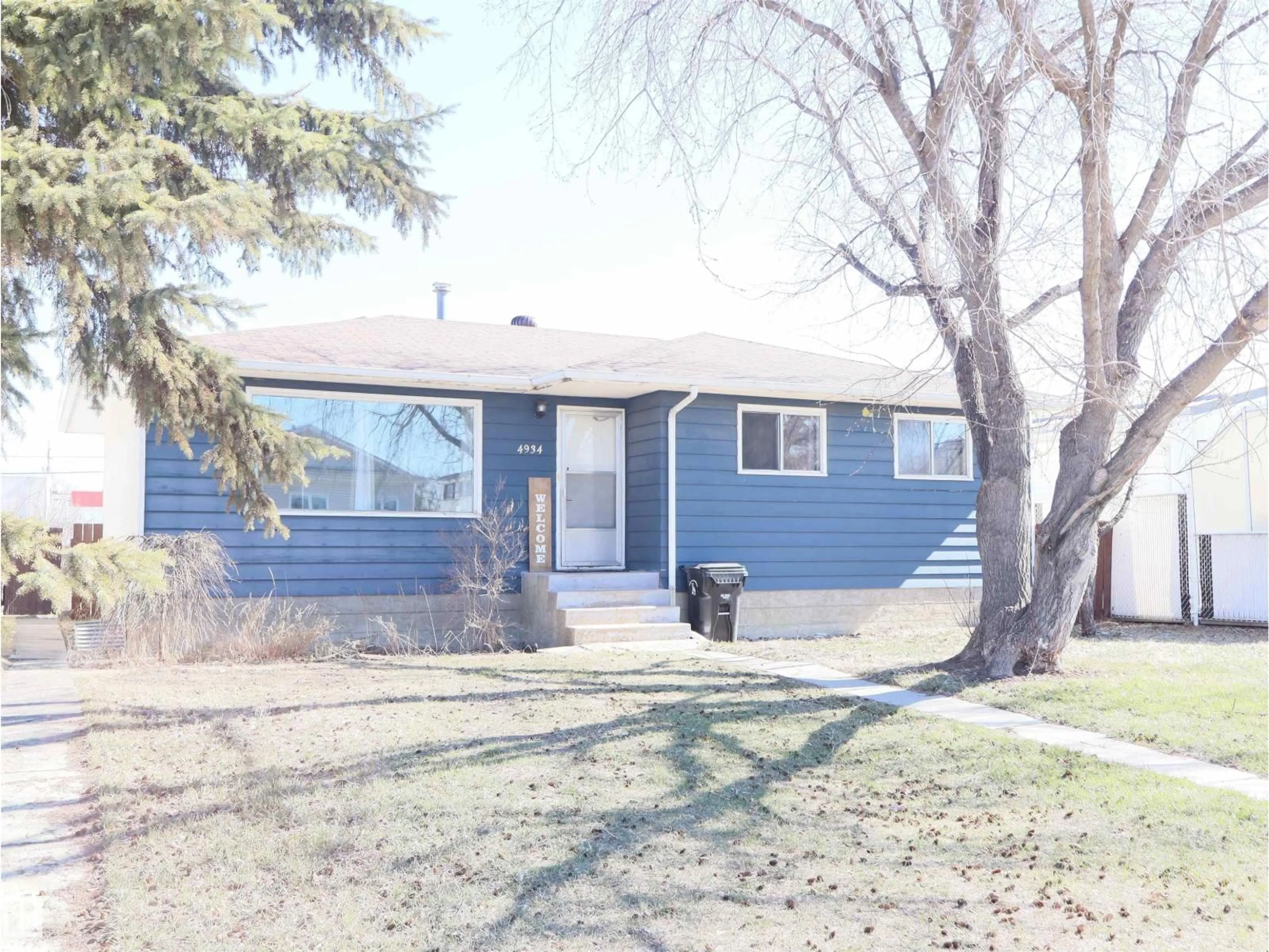 Home with vinyl exterior material, street for 4934 49 AVENUE, Barrhead Alberta T7N1G6