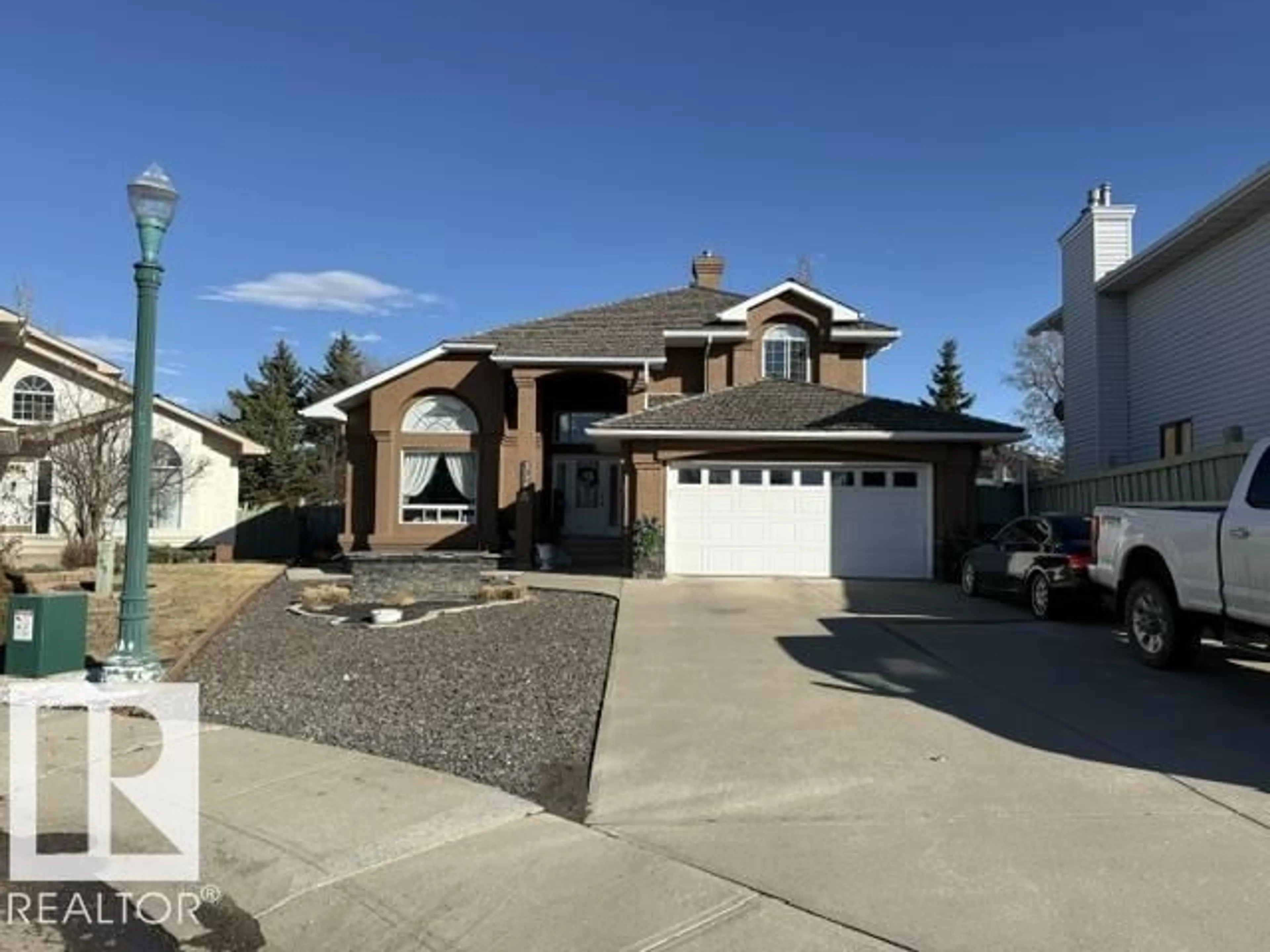 Home with vinyl exterior material, street for 356 WEBER WY, Edmonton Alberta T6M2H2