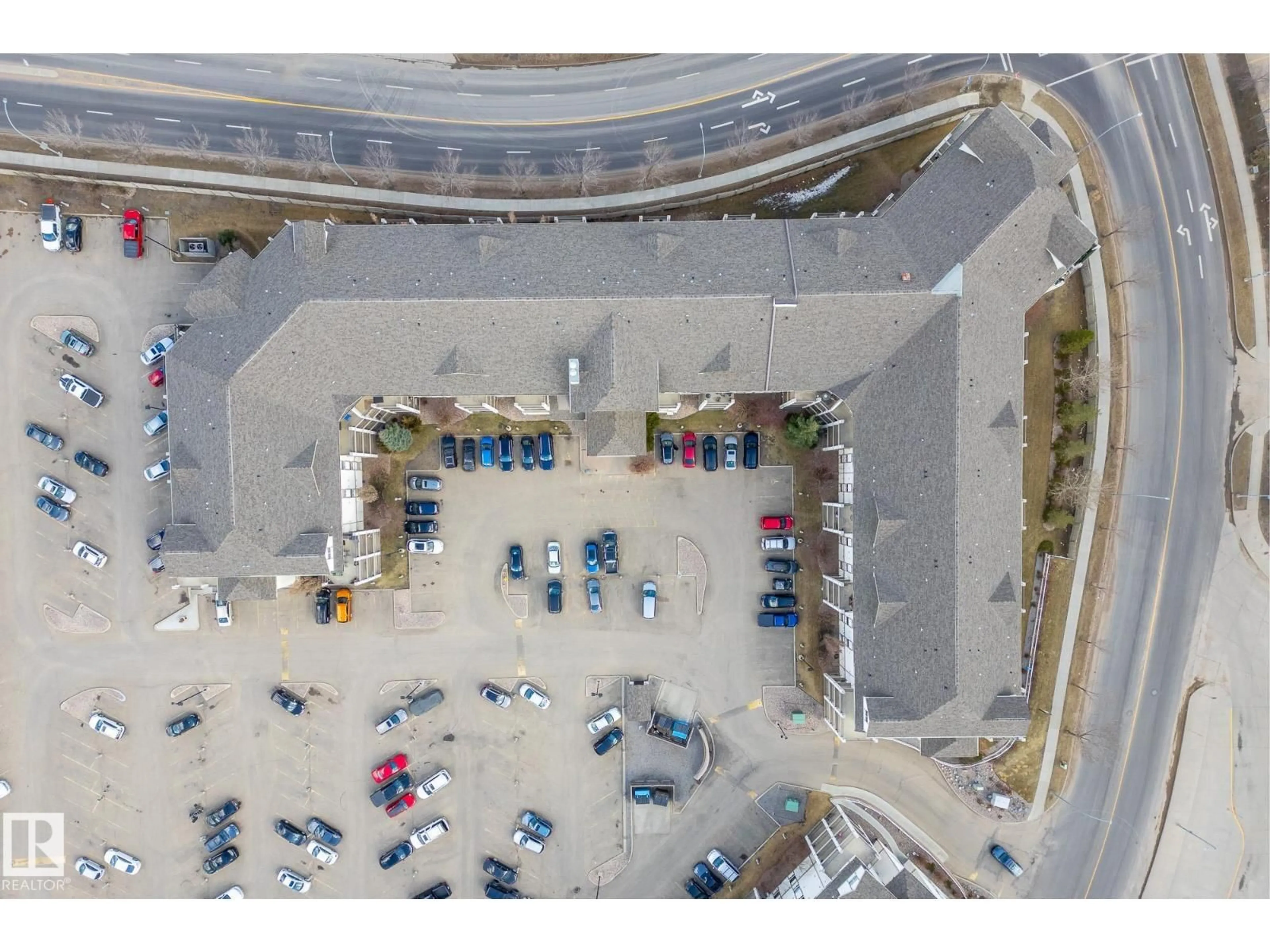 A pic from outside/outdoor area/front of a property/back of a property/a pic from drone, street for 1306 - 330 CLAREVIEW STATION DR, Edmonton Alberta T5Y0E6