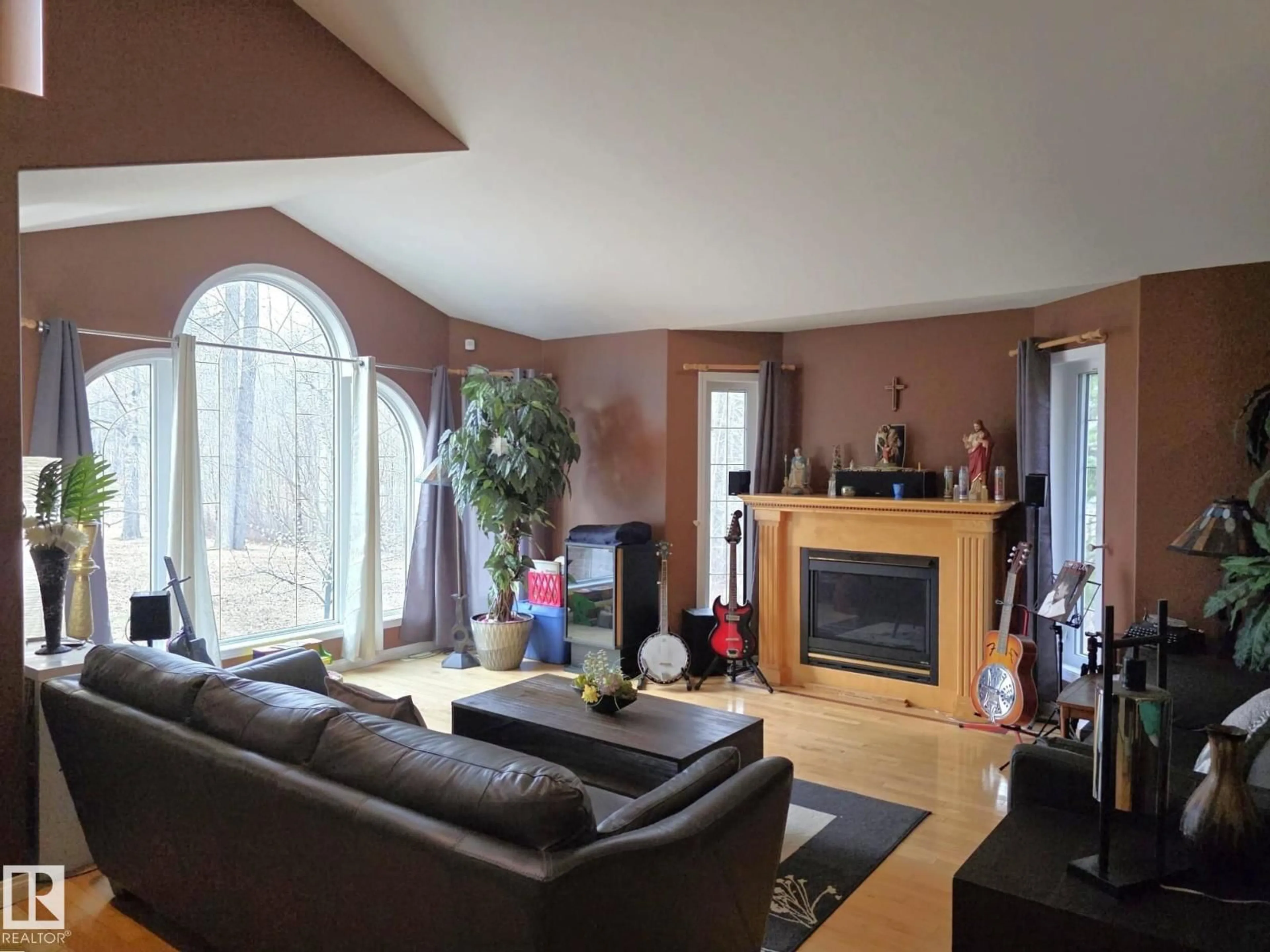 Living room with furniture, wood/laminate floor for #302 - 49006 RANGE ROAD 73, Rural Brazeau County Alberta T7A2A2