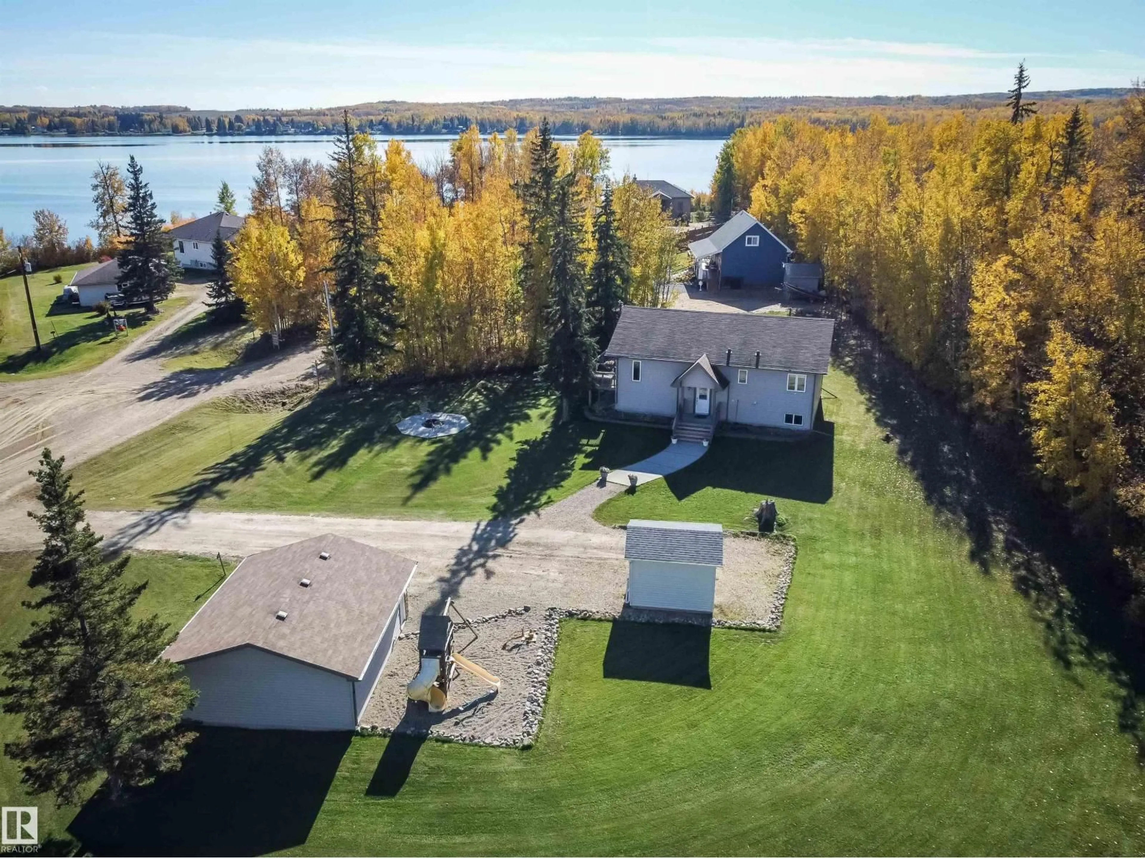 A pic from outside/outdoor area/front of a property/back of a property/a pic from drone, water/lake/river/ocean view for 53414 - 424 RGE ROAD 62, Rural Lac Ste. Anne County Alberta T0E1H0