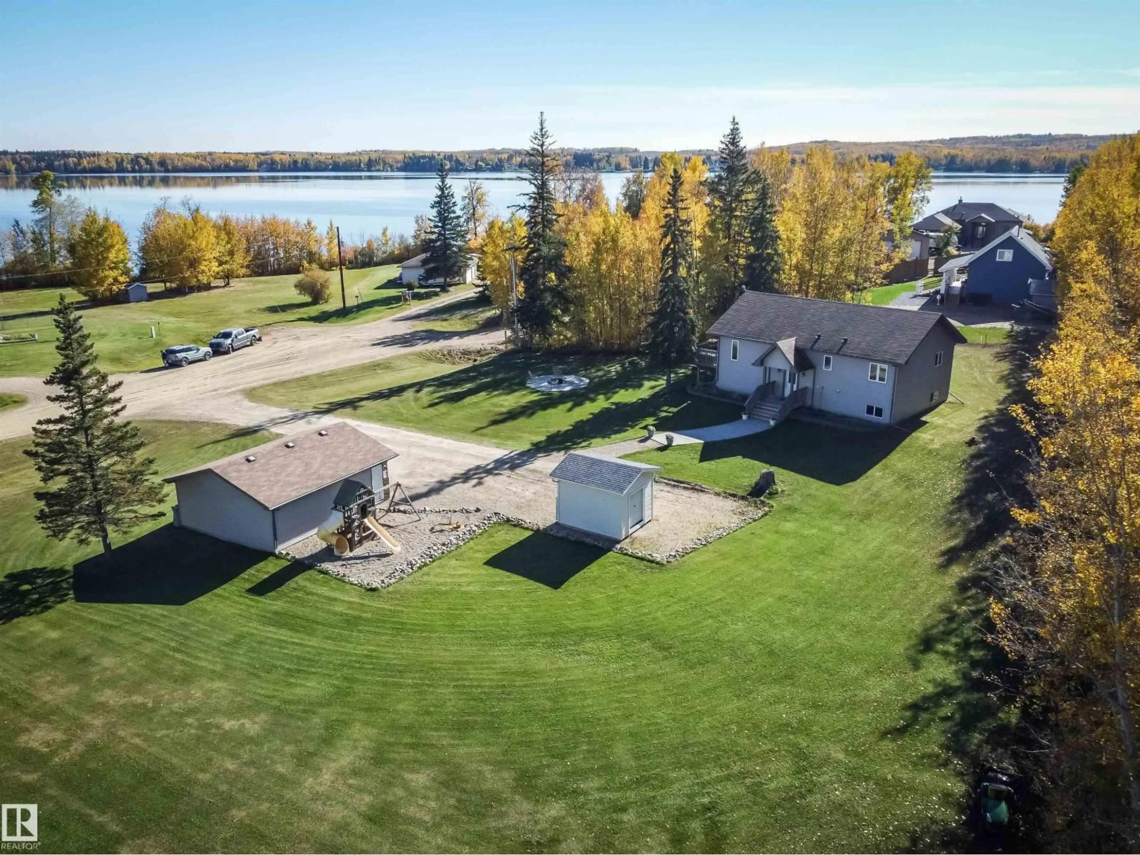 A pic from outside/outdoor area/front of a property/back of a property/a pic from drone, water/lake/river/ocean view for 53414 - 424 RGE ROAD 62, Rural Lac Ste. Anne County Alberta T0E1H0