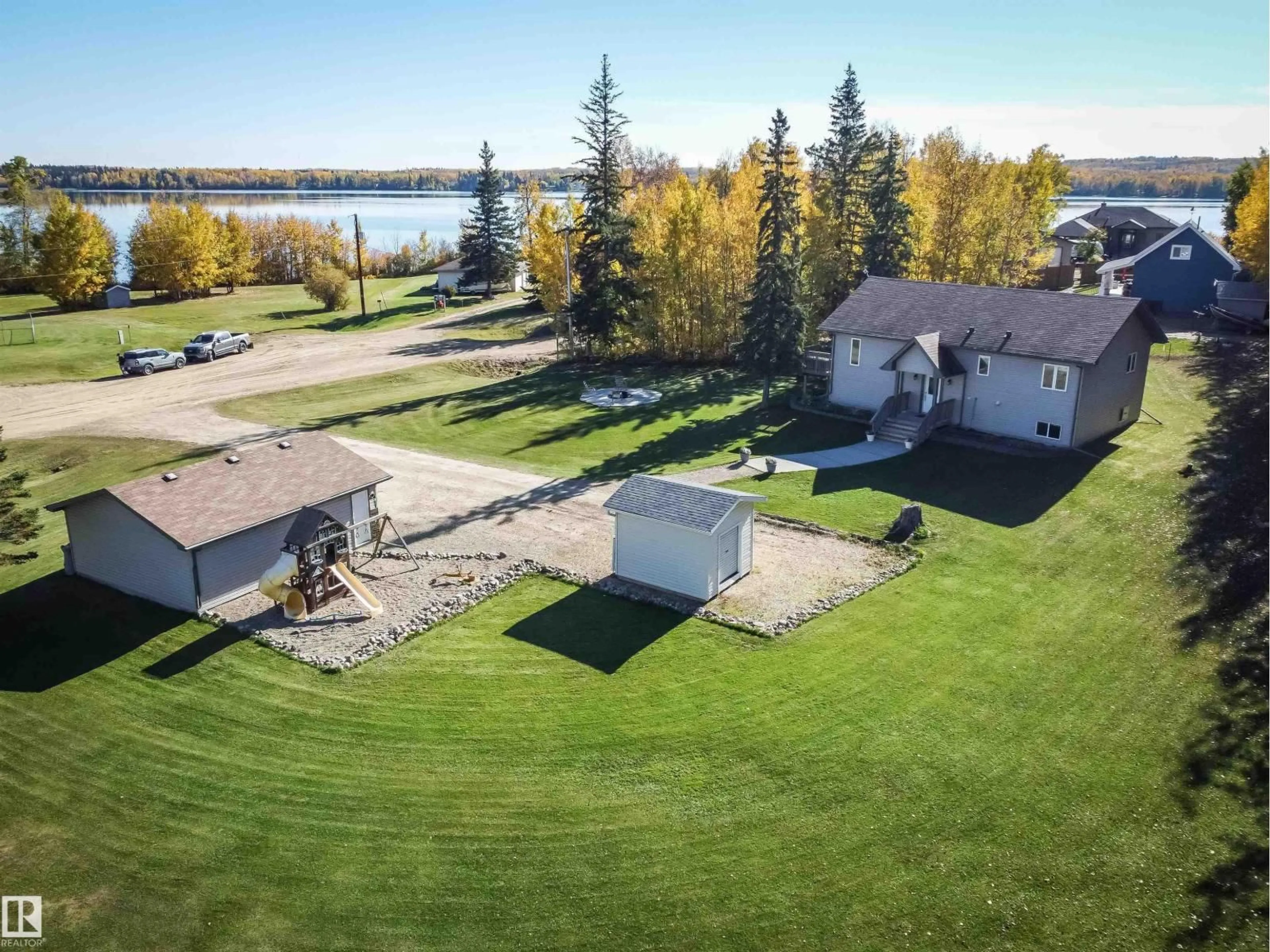 A pic from outside/outdoor area/front of a property/back of a property/a pic from drone, water/lake/river/ocean view for 53414 - 424 RGE ROAD 62, Rural Lac Ste. Anne County Alberta T0E1H0