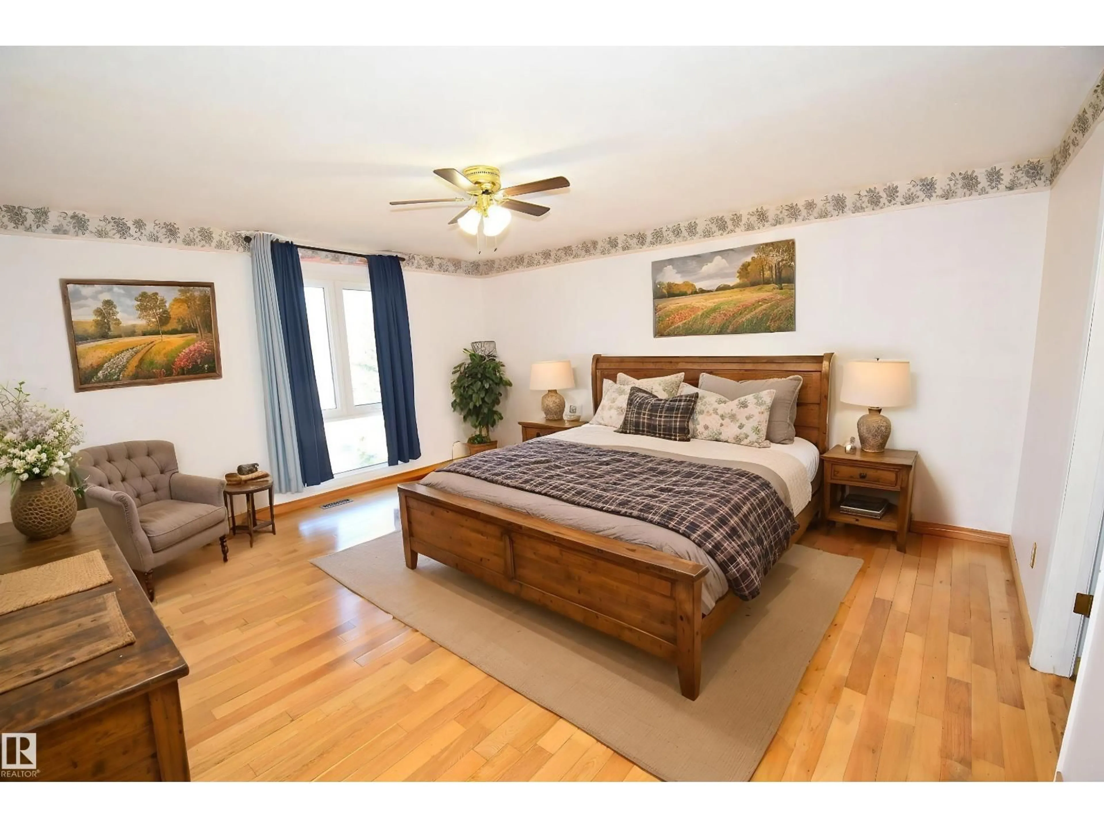 Bedroom with bed, wood/laminate floor for 9 - 9 TWP ROAD 544 TWP ROAD, Rural Sturgeon County Alberta T8R2B5
