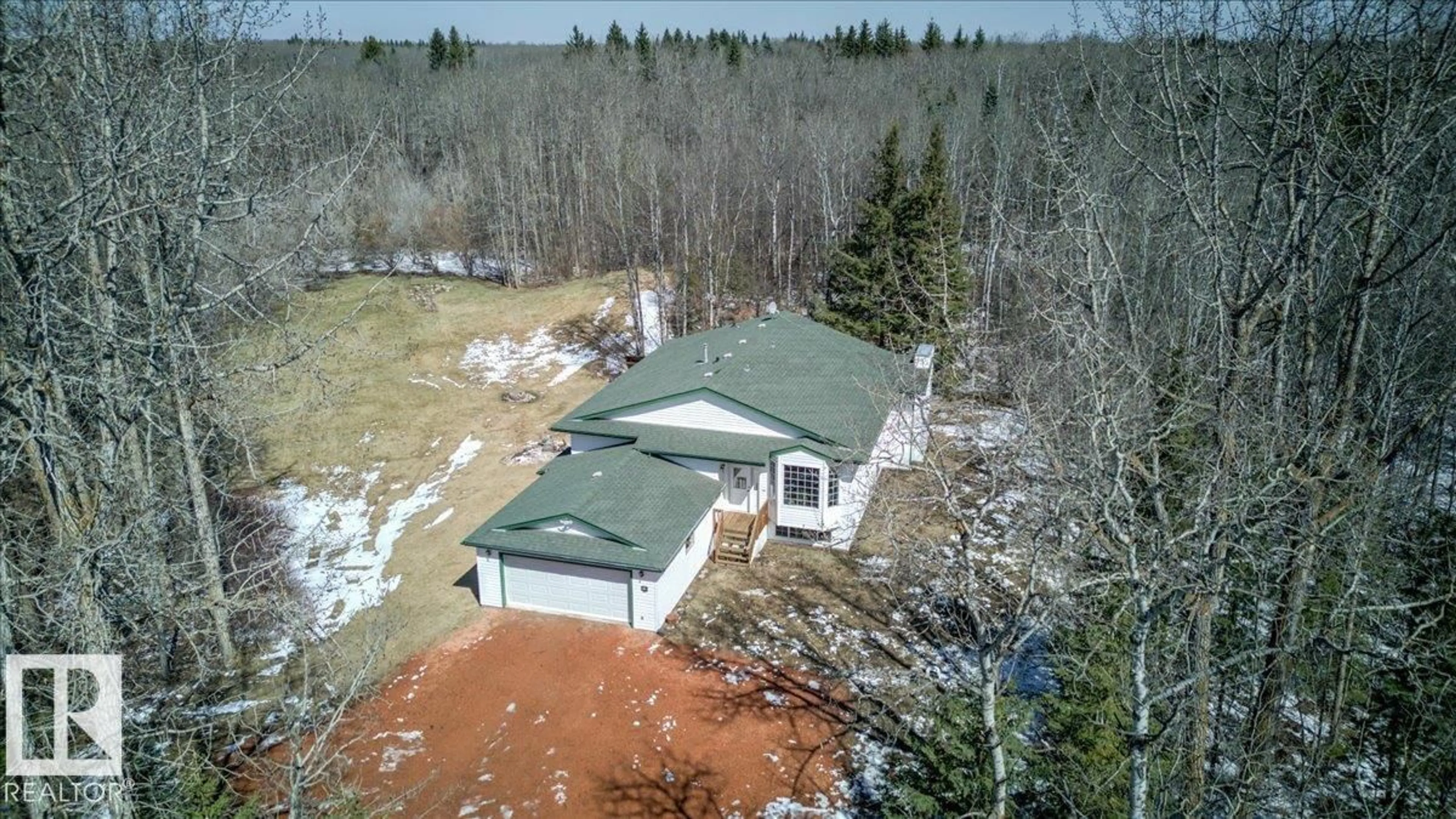 A pic from outside/outdoor area/front of a property/back of a property/a pic from drone, unknown for 310 - 50247 RGE RD, Rural Leduc County Alberta T4X0K9