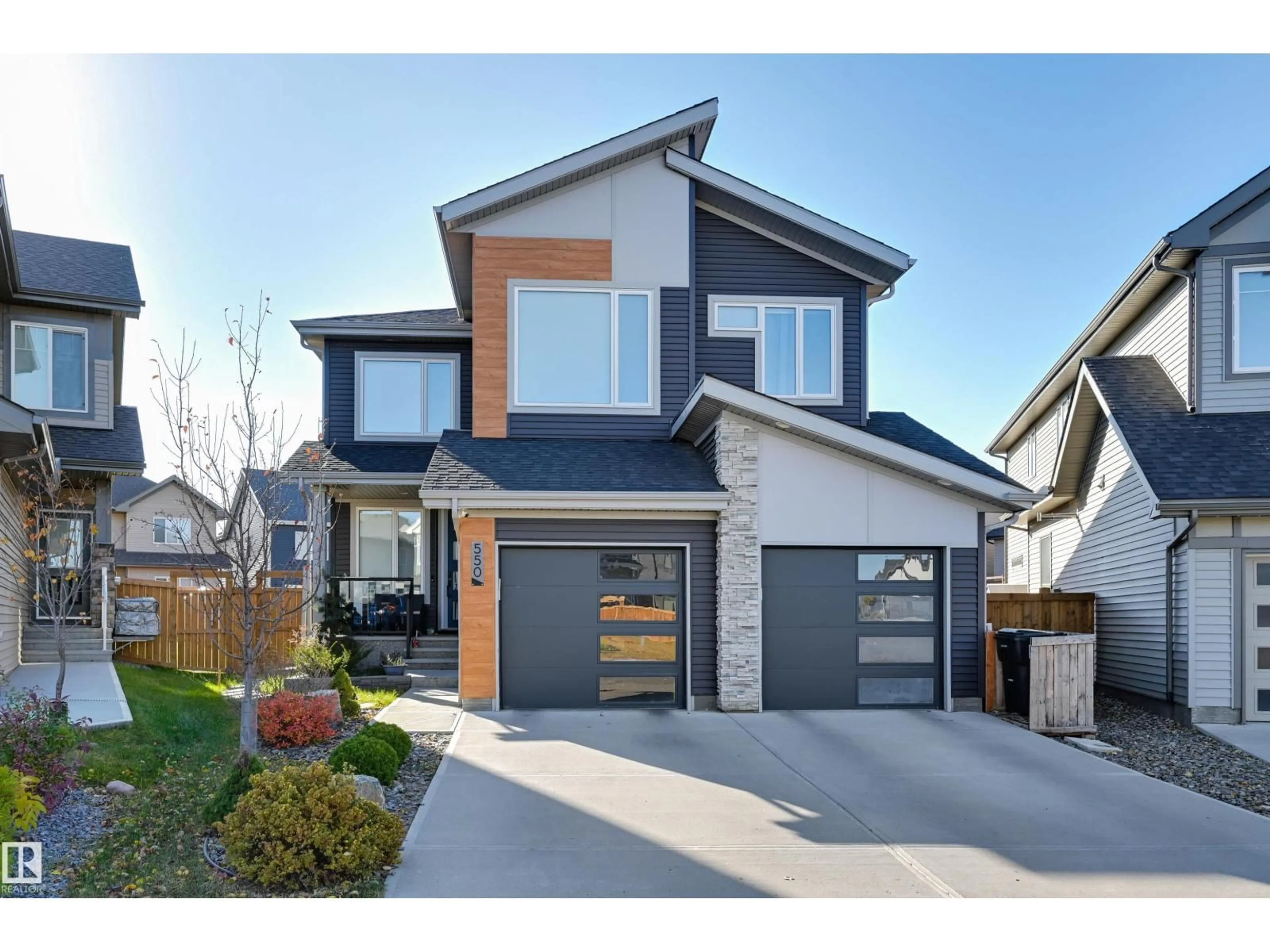 Home with brick exterior material, street for 550 EAGLESON WD, Edmonton Alberta T6M0Y4