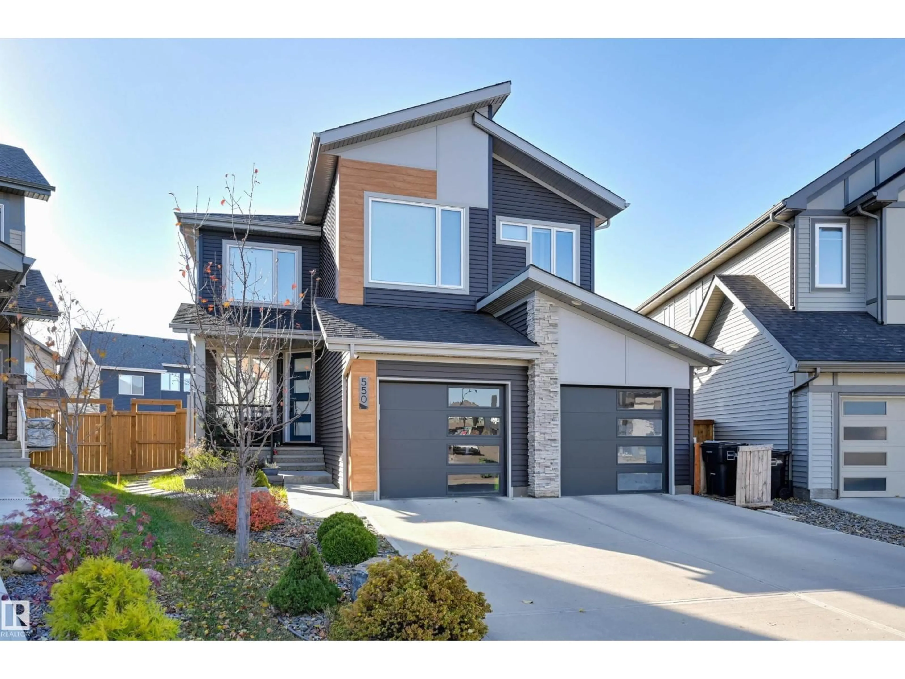 Home with brick exterior material, street for 550 EAGLESON WD, Edmonton Alberta T6M0Y4