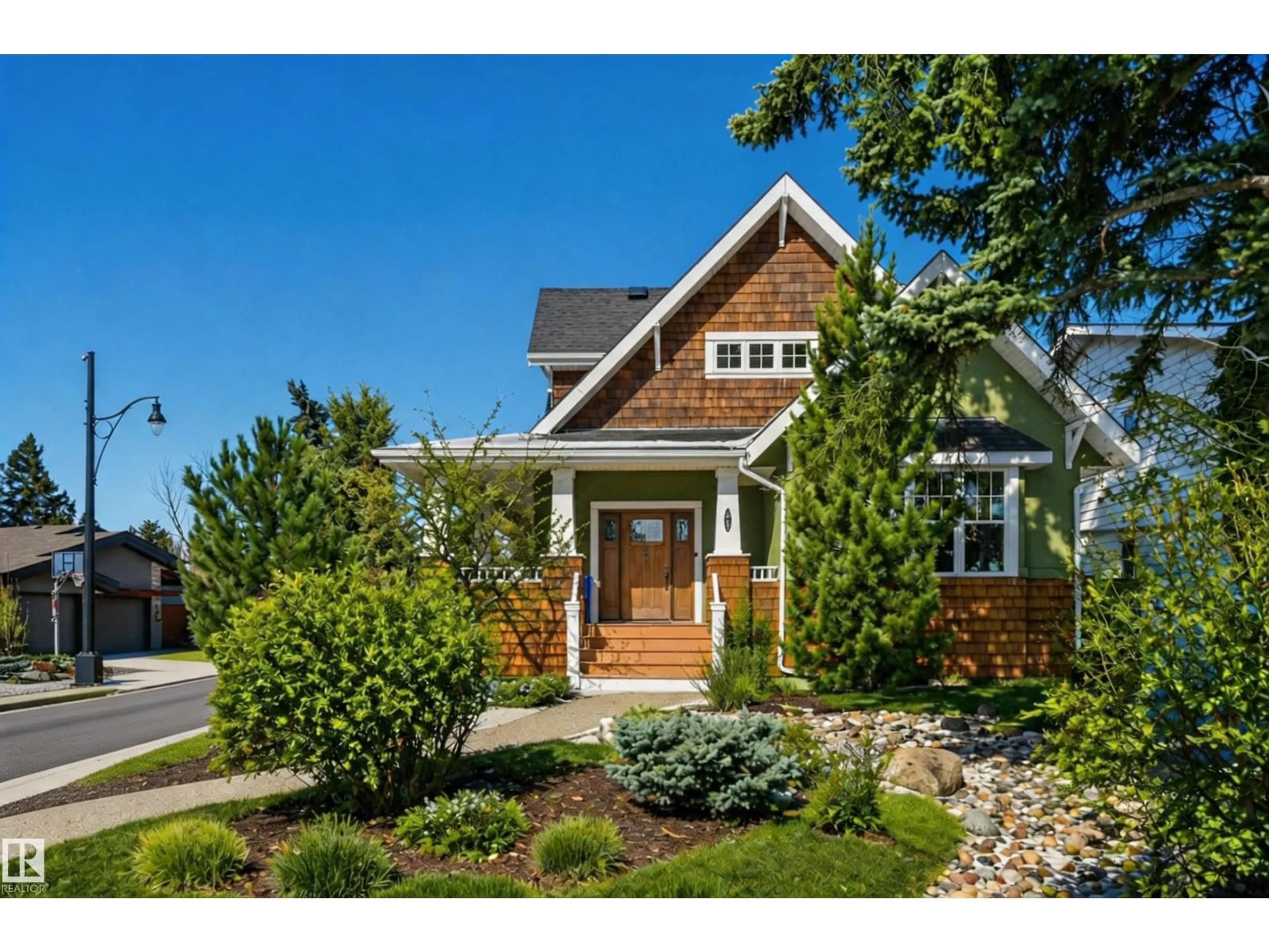 Home with brick exterior material, street for 14504 MACKENZIE DR, Edmonton Alberta T5R5V9