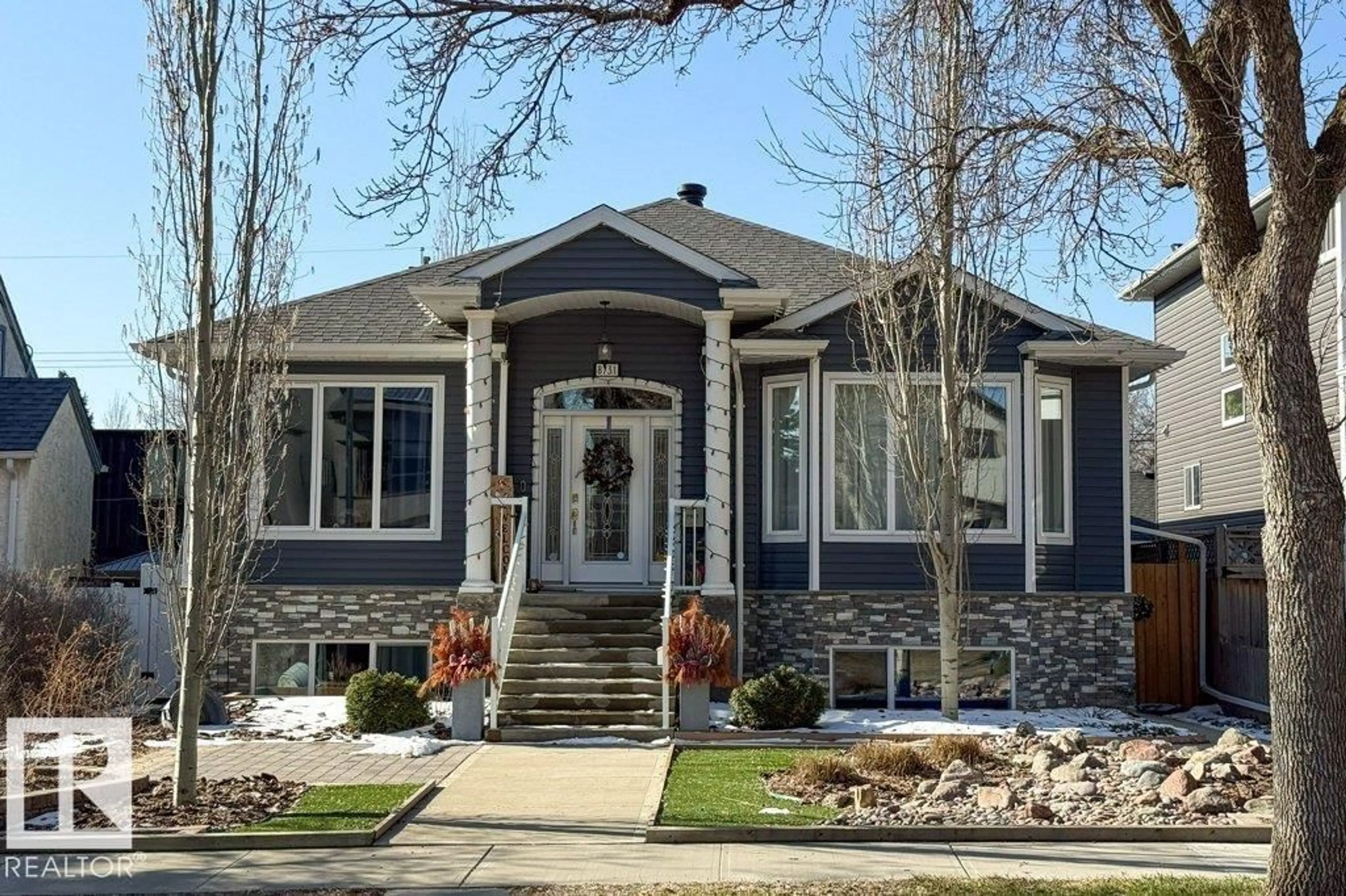 Home with vinyl exterior material, street for 8731 85 AV, Edmonton Alberta T6C1G8