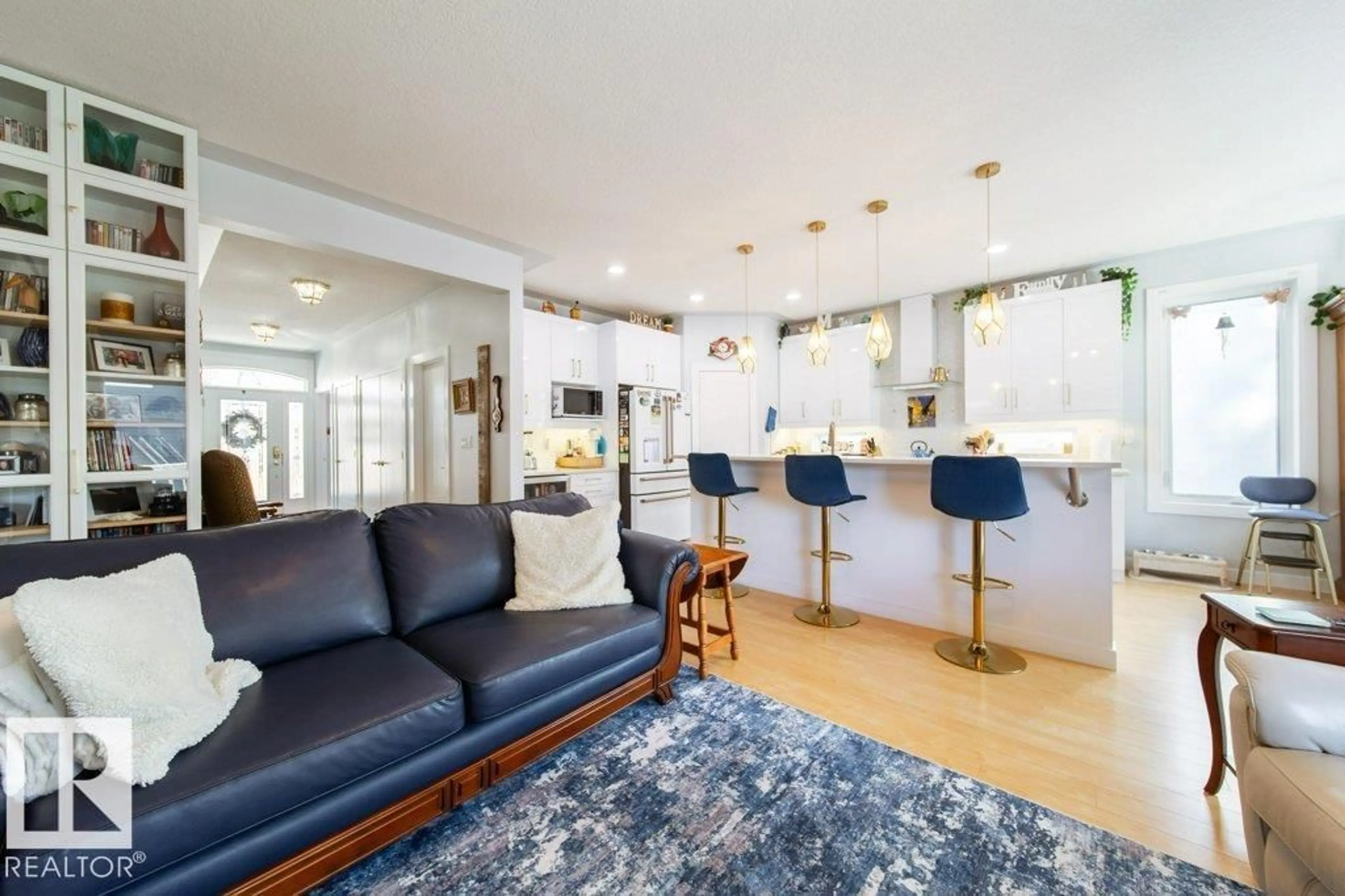 Living room with furniture, unknown for 8731 85 AV, Edmonton Alberta T6C1G8