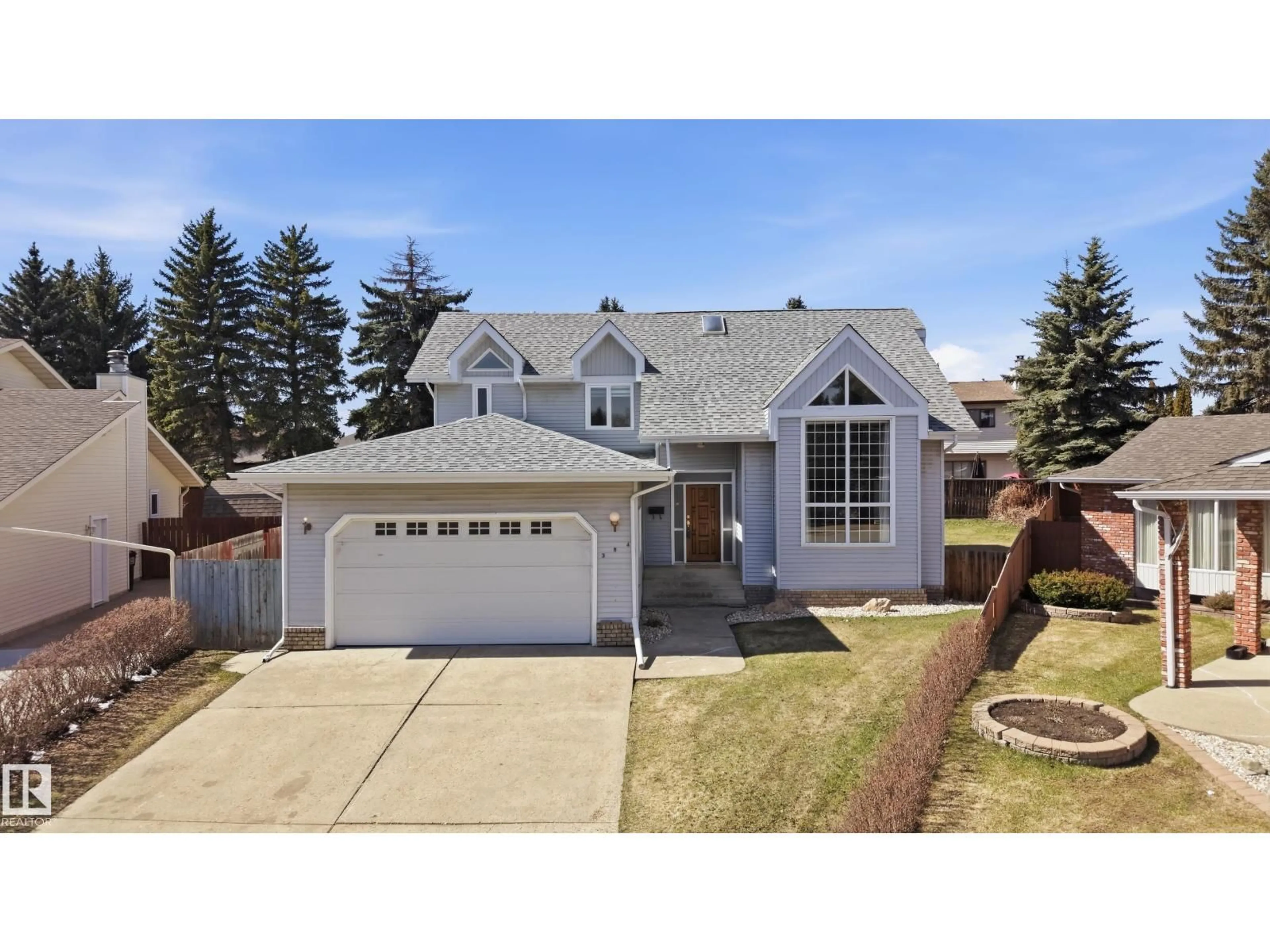 Home with vinyl exterior material, street for 394 WALKER RD, Edmonton Alberta T5T2X2