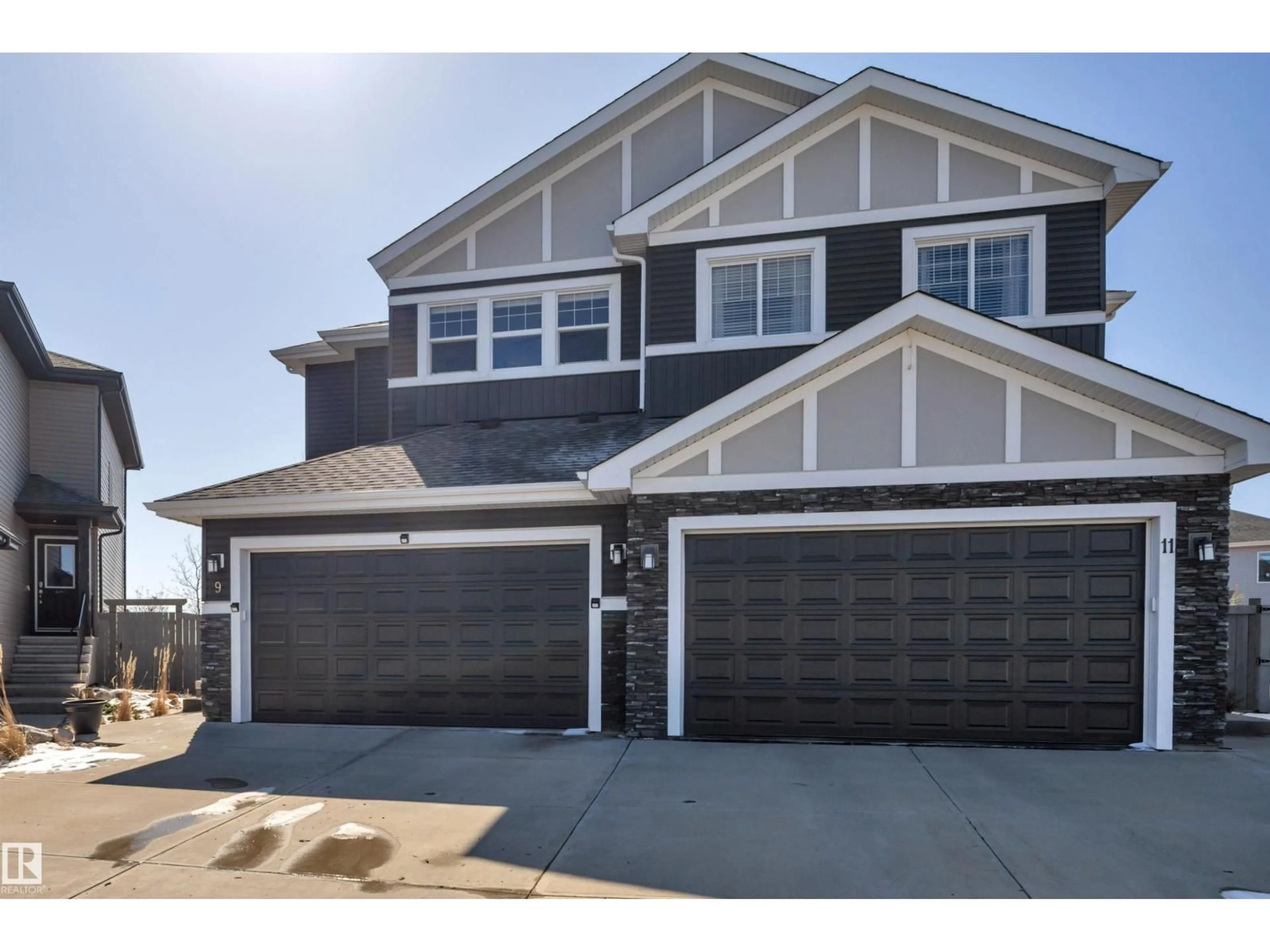 Home with vinyl exterior material, street for 9 ROLSTON CL, Leduc Alberta T9E1G6