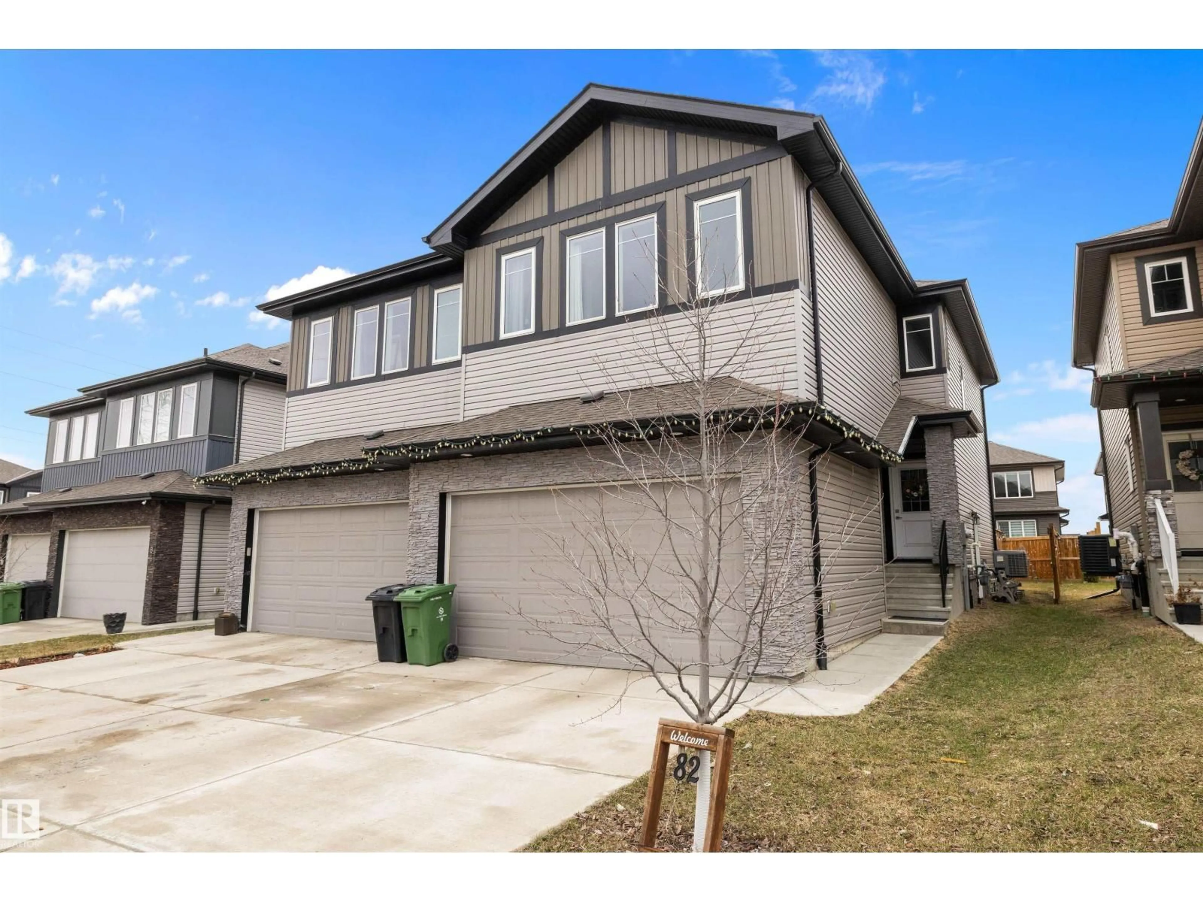 Home with vinyl exterior material, street for 82 WINGATE WY, Fort Saskatchewan Alberta T8L0W7