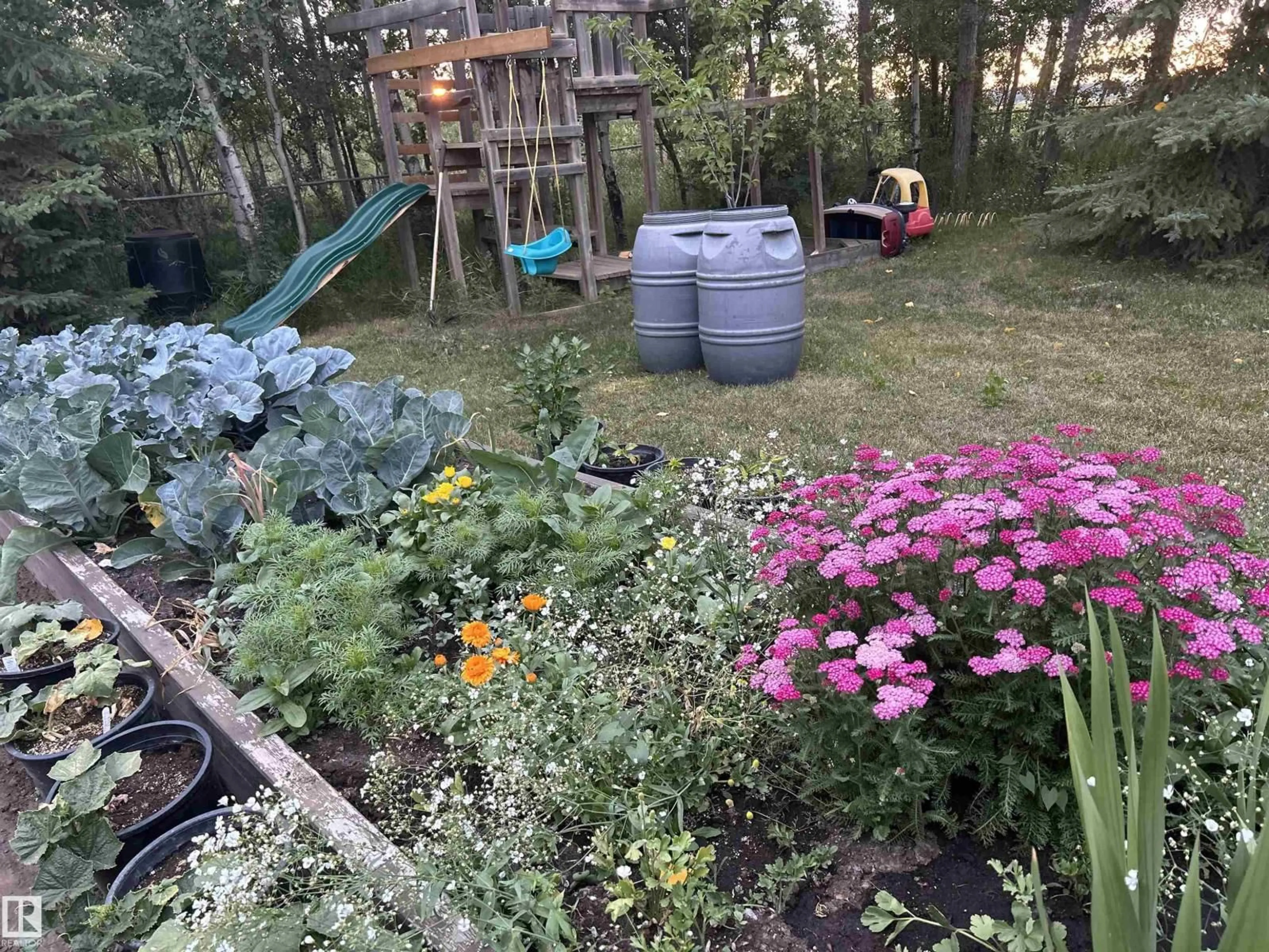 A pic from outside/outdoor area/front of a property/back of a property/a pic from drone, unknown for 56532 RG RD 11, Rural Sturgeon County Alberta T8R0L1