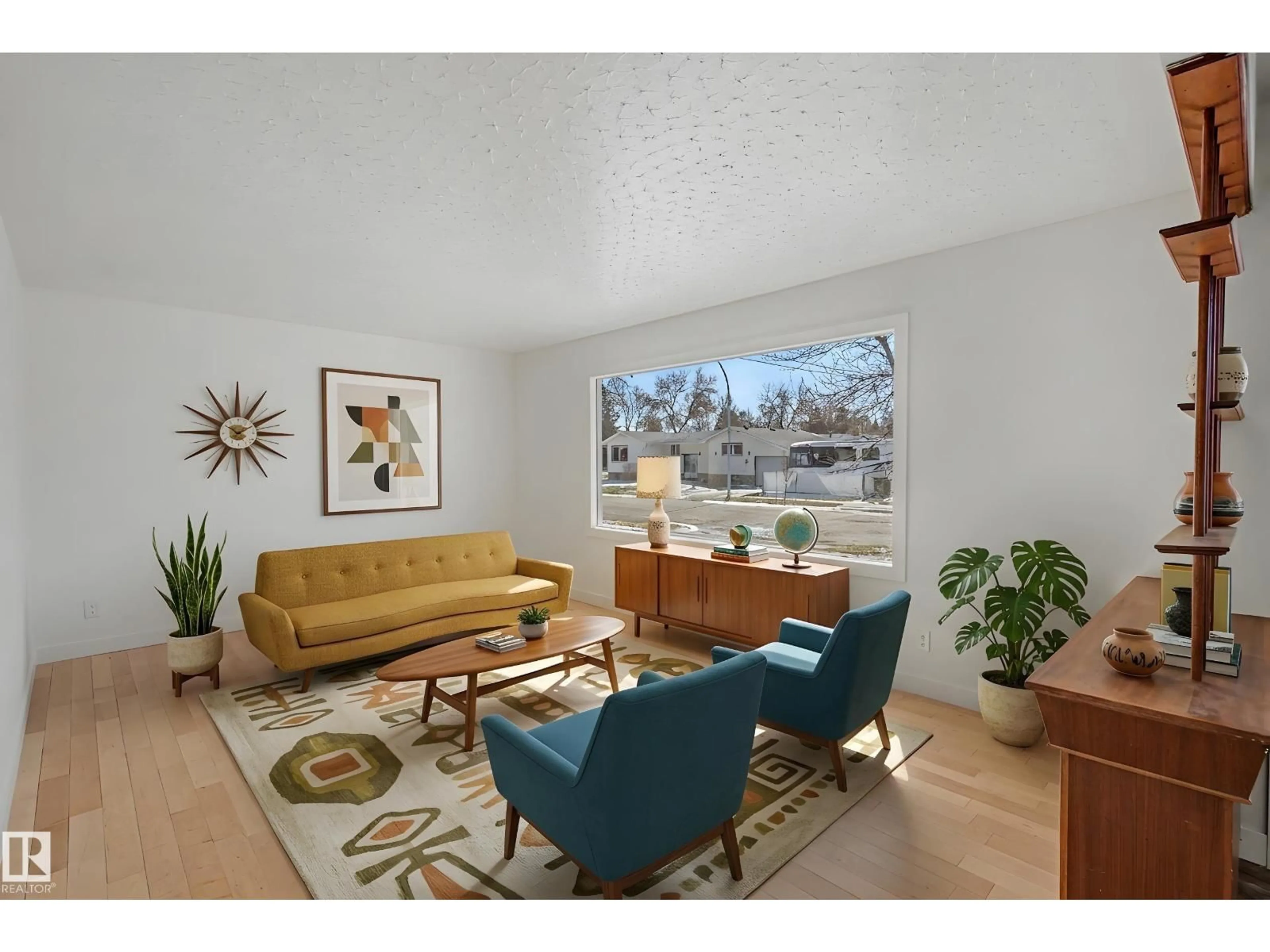 Living room with furniture, wood/laminate floor for 3810 110 AV, Edmonton Alberta T5W0H7