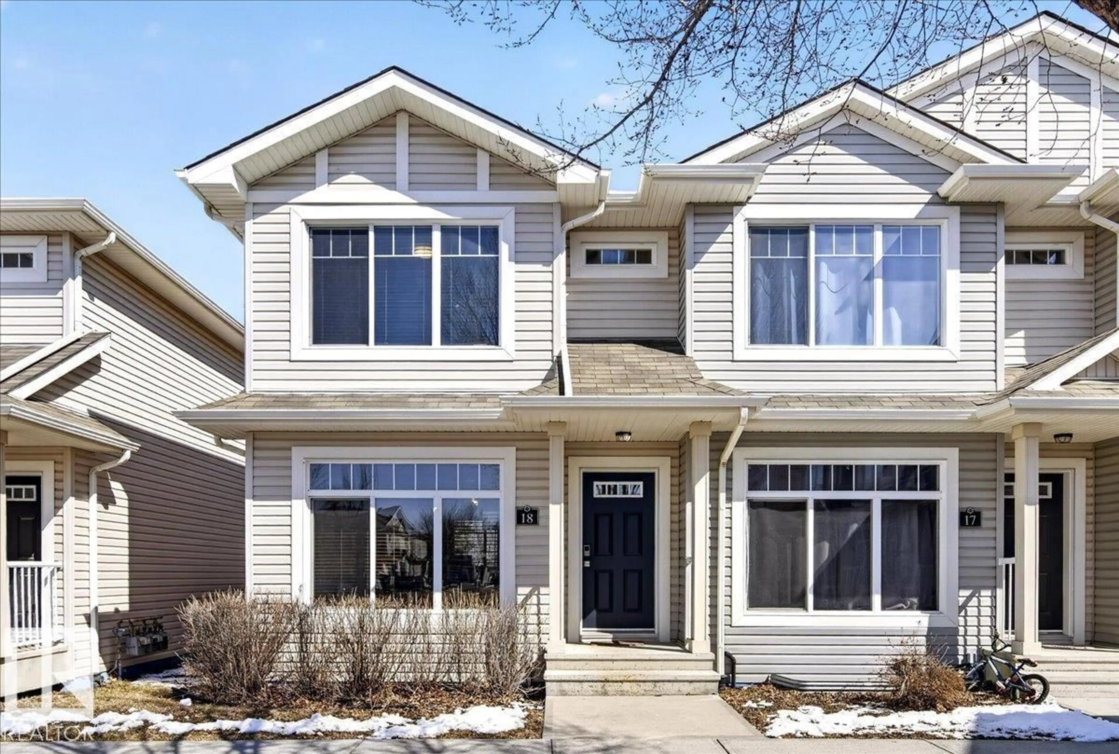 Home with vinyl exterior material, street for #18 - 6032 38 AV NW, Edmonton Alberta T6L0A4