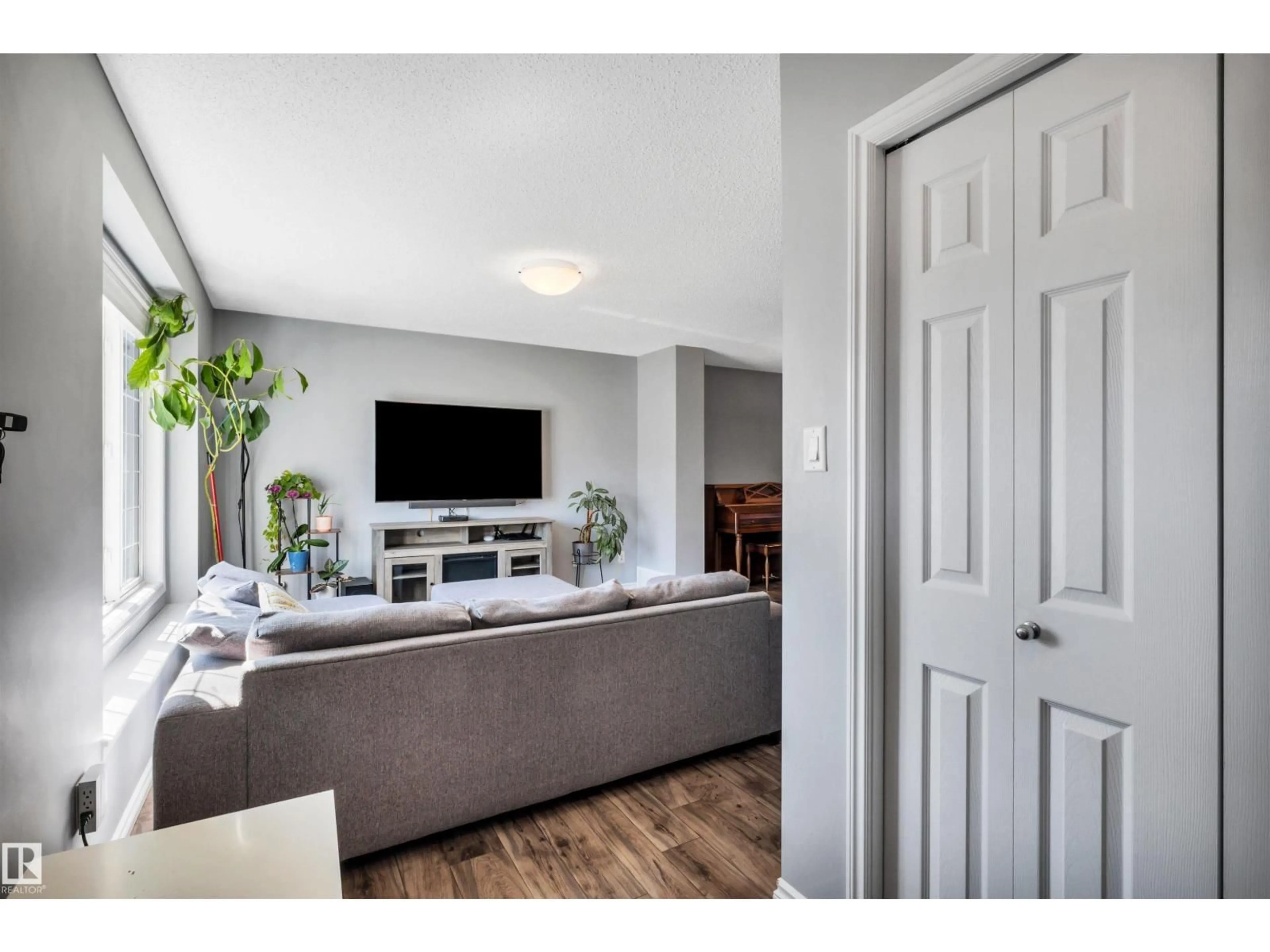 Living room with furniture, unknown for 2424 WONNACOTT CT, Edmonton Alberta T6X2K5