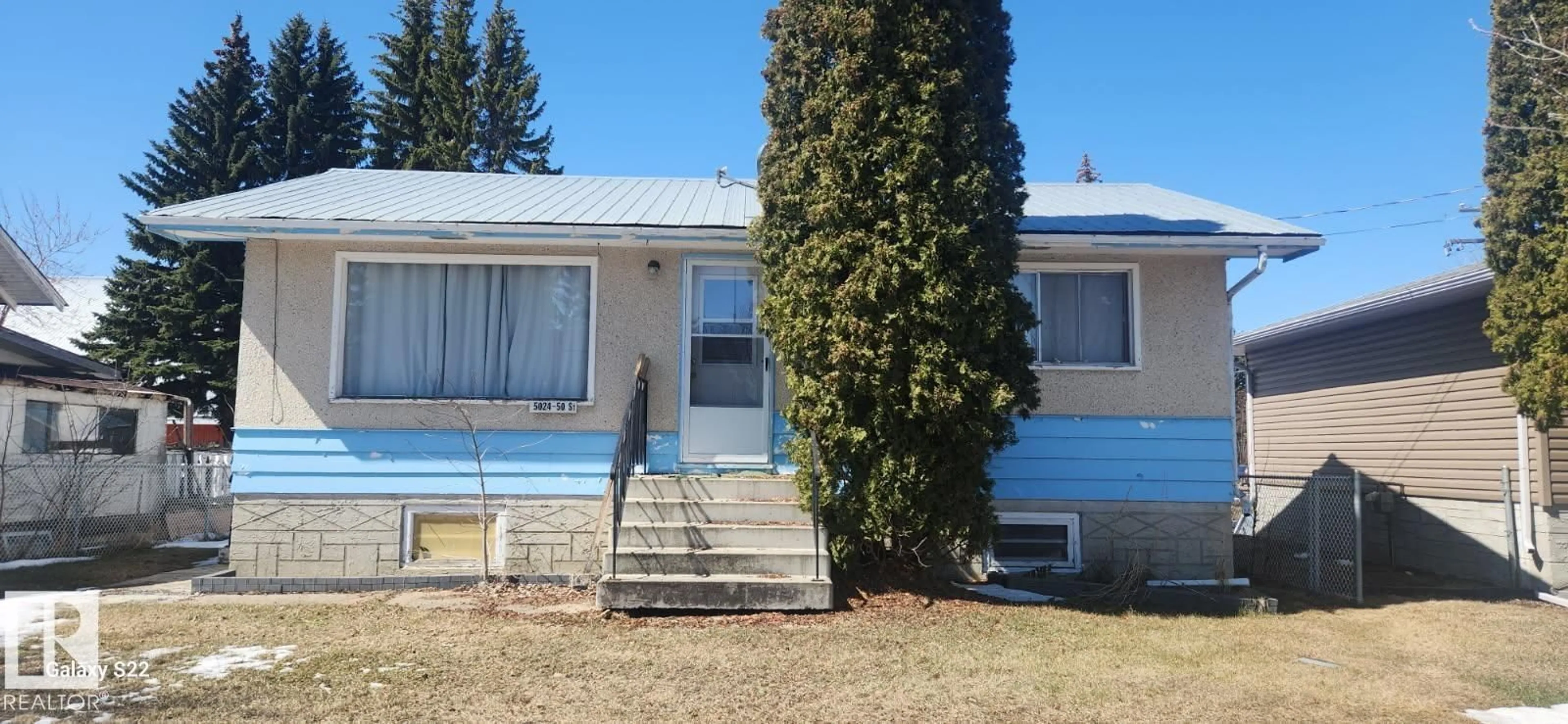 Home with vinyl exterior material, street for 5024 50 ST, Andrew Alberta T0B0B0