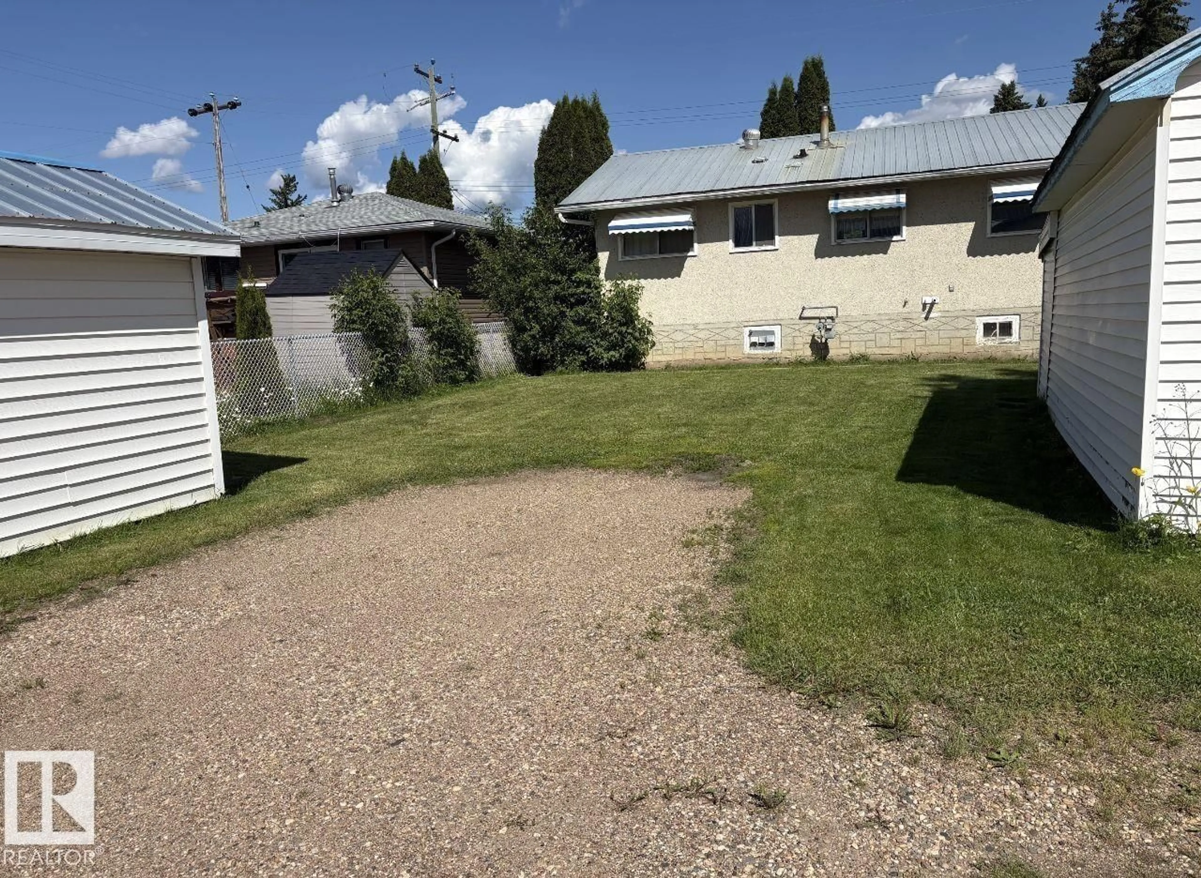 A pic from outside/outdoor area/front of a property/back of a property/a pic from drone, street for 5024 50 ST, Andrew Alberta T0B0C0