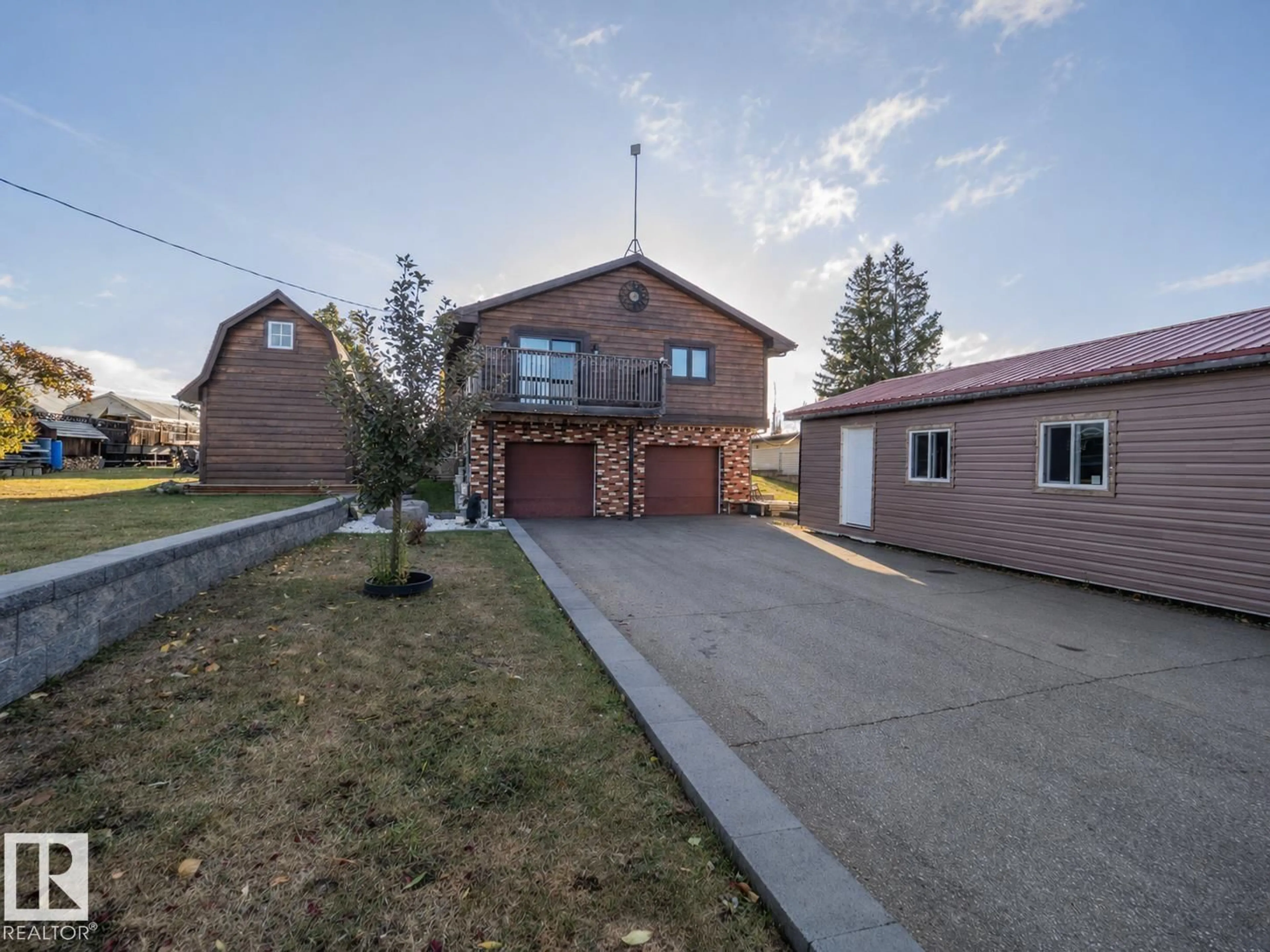 A pic from outside/outdoor area/front of a property/back of a property/a pic from drone, street for 403 4 ST, Rural Lac Ste. Anne County Alberta T0E1A0
