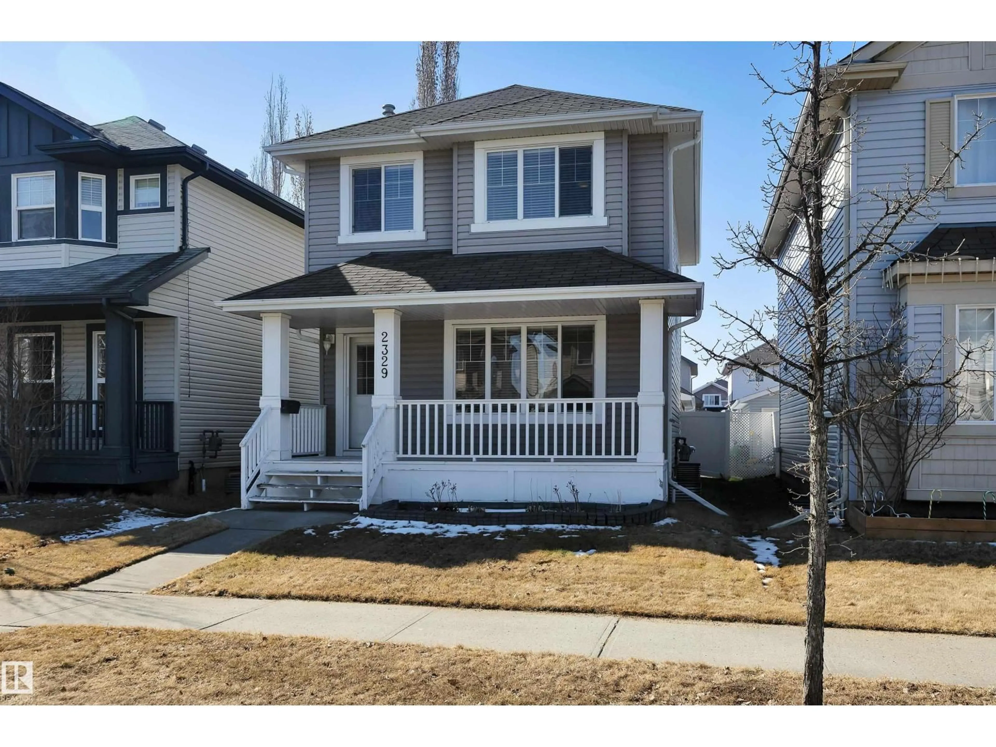 Home with vinyl exterior material, street for 2329 29A AV, Edmonton Alberta T6T2B1
