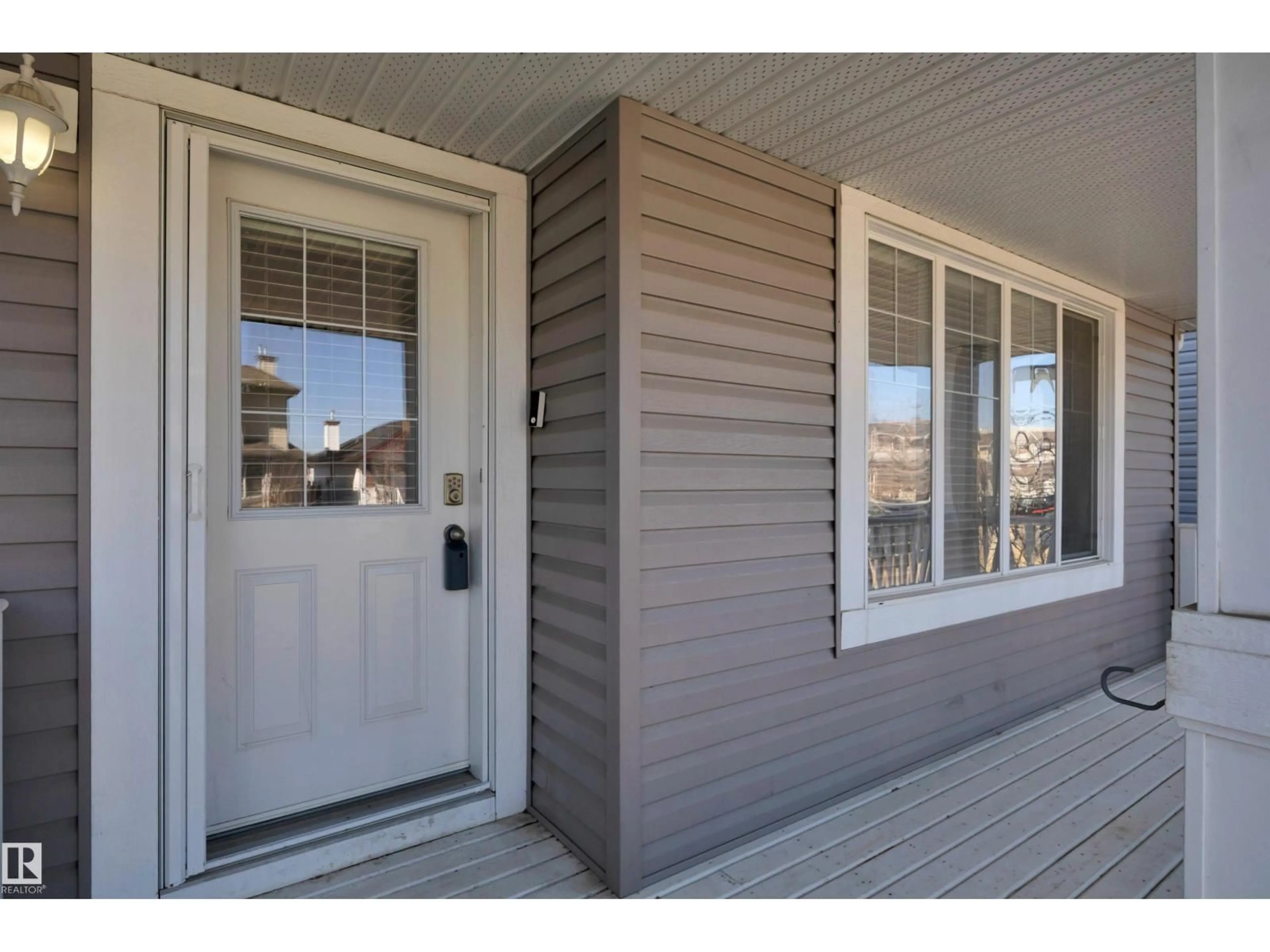 Home with vinyl exterior material, street for 2329 29A AV, Edmonton Alberta T6T2B1