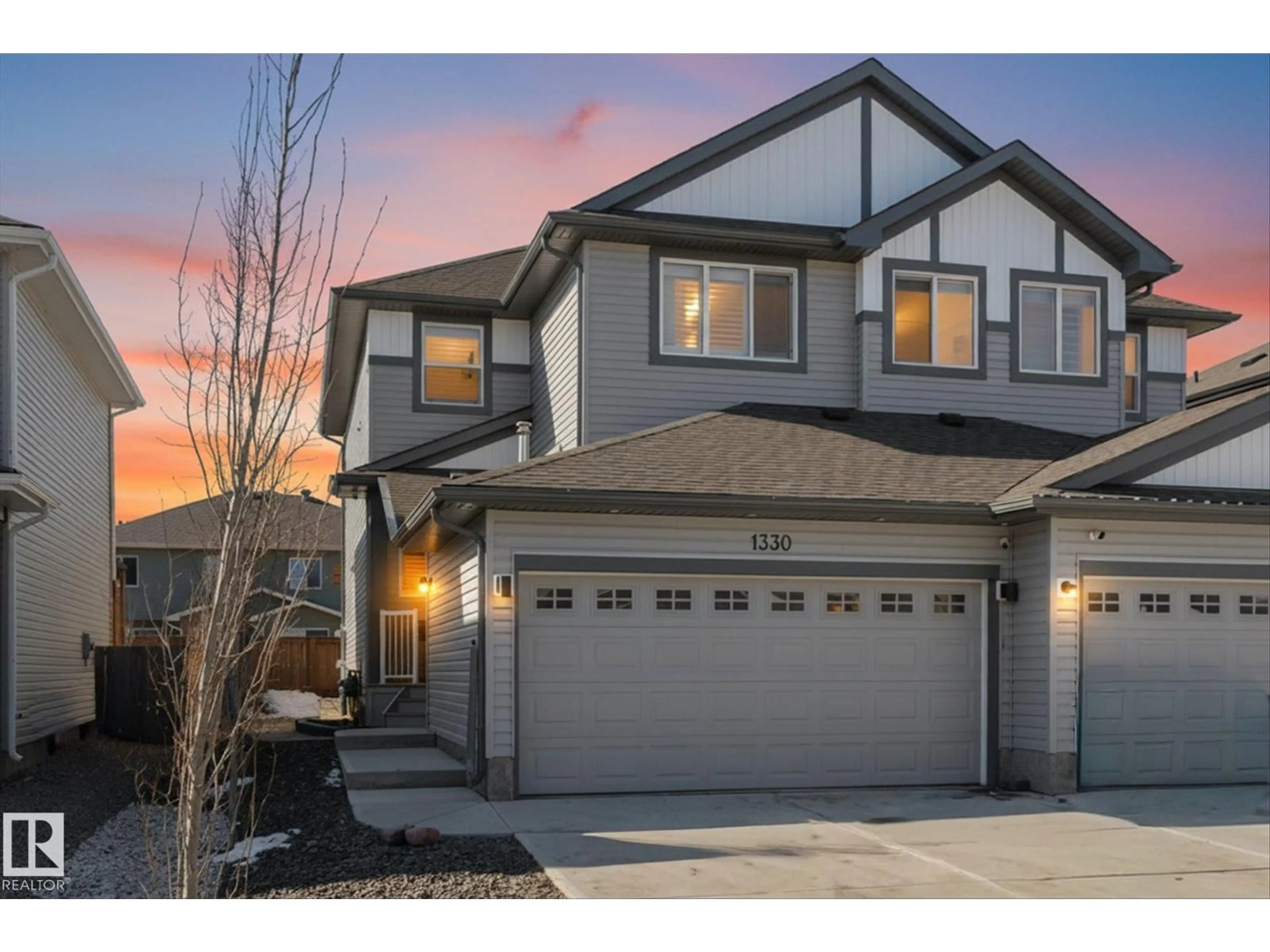 Home with vinyl exterior material, street for 1330 SOUTH CREEK LI, Stony Plain Alberta T7Z0K6
