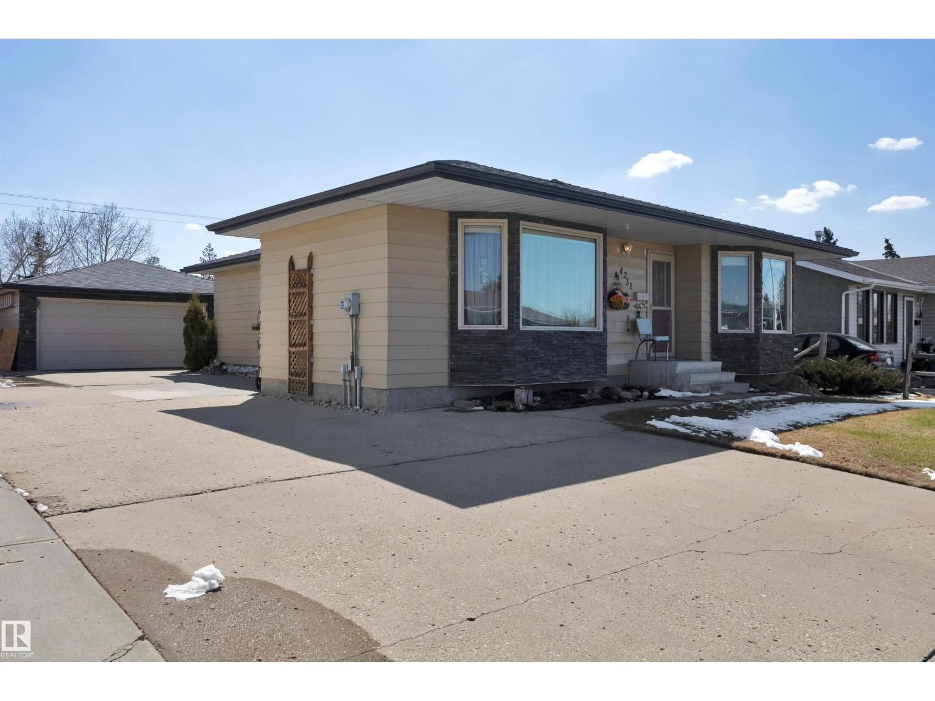 Home with vinyl exterior material, street for 4231 39 AV, Leduc Alberta T9E4X4