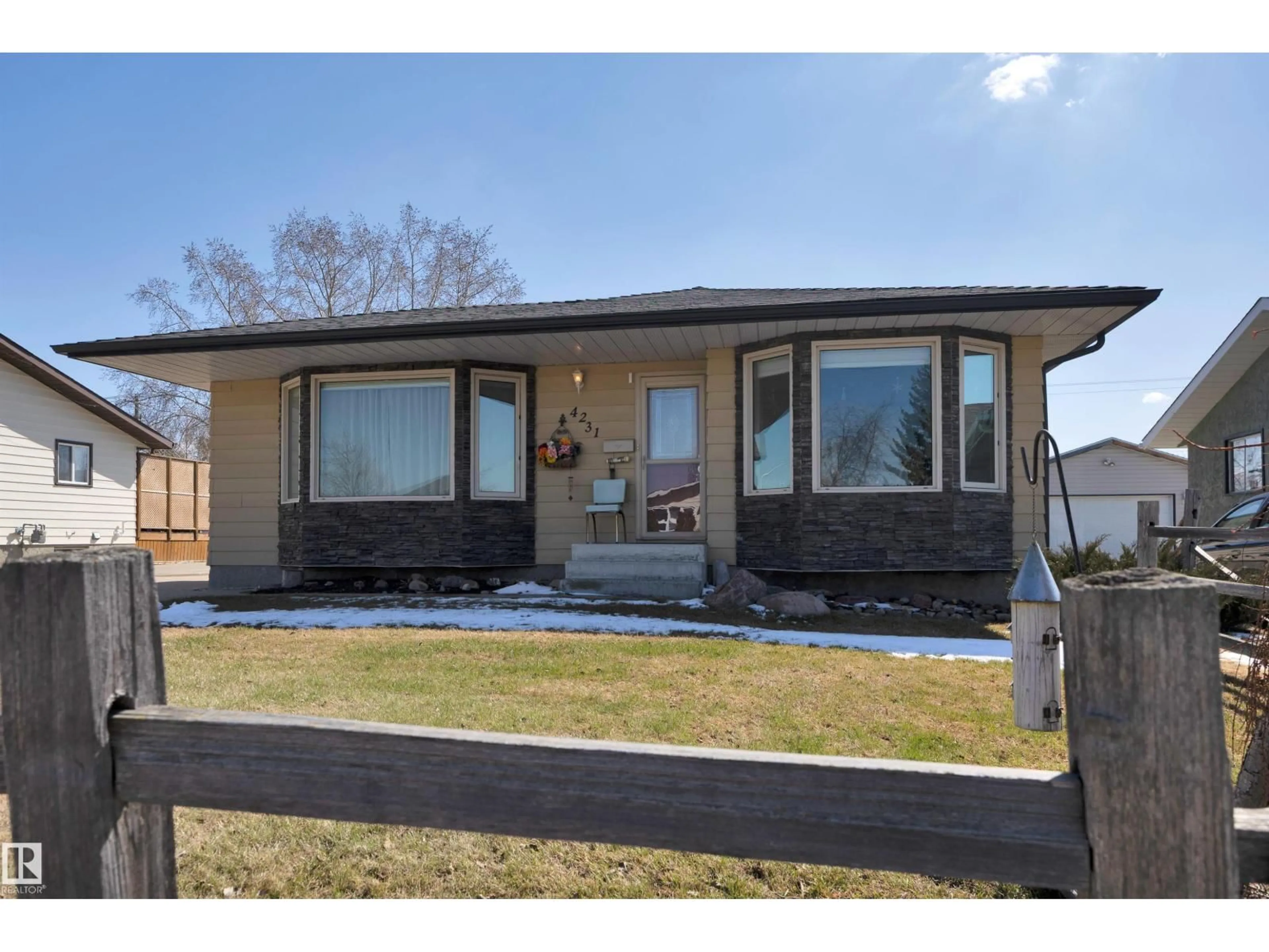 Home with vinyl exterior material, street for 4231 39 AV, Leduc Alberta T9E4X4