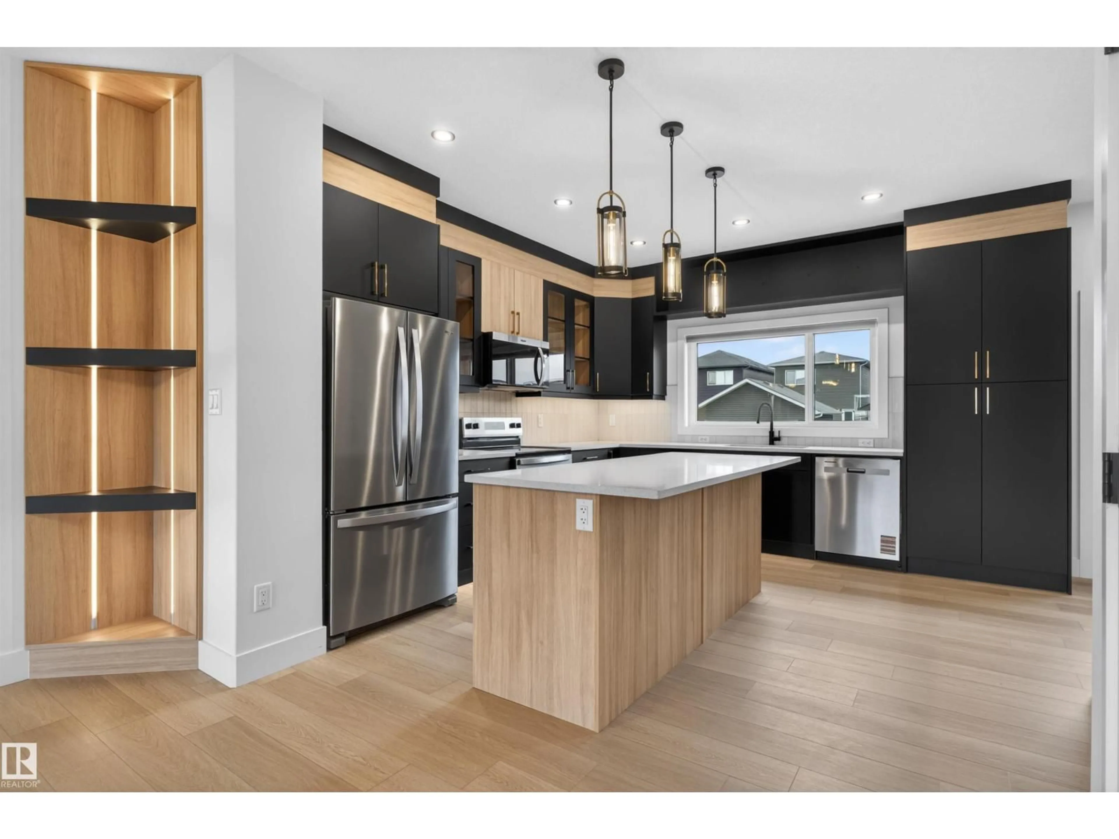 Open concept kitchen, wood/laminate floor for 45 RIVER BIRCH, St. Albert Alberta T8N7Y6
