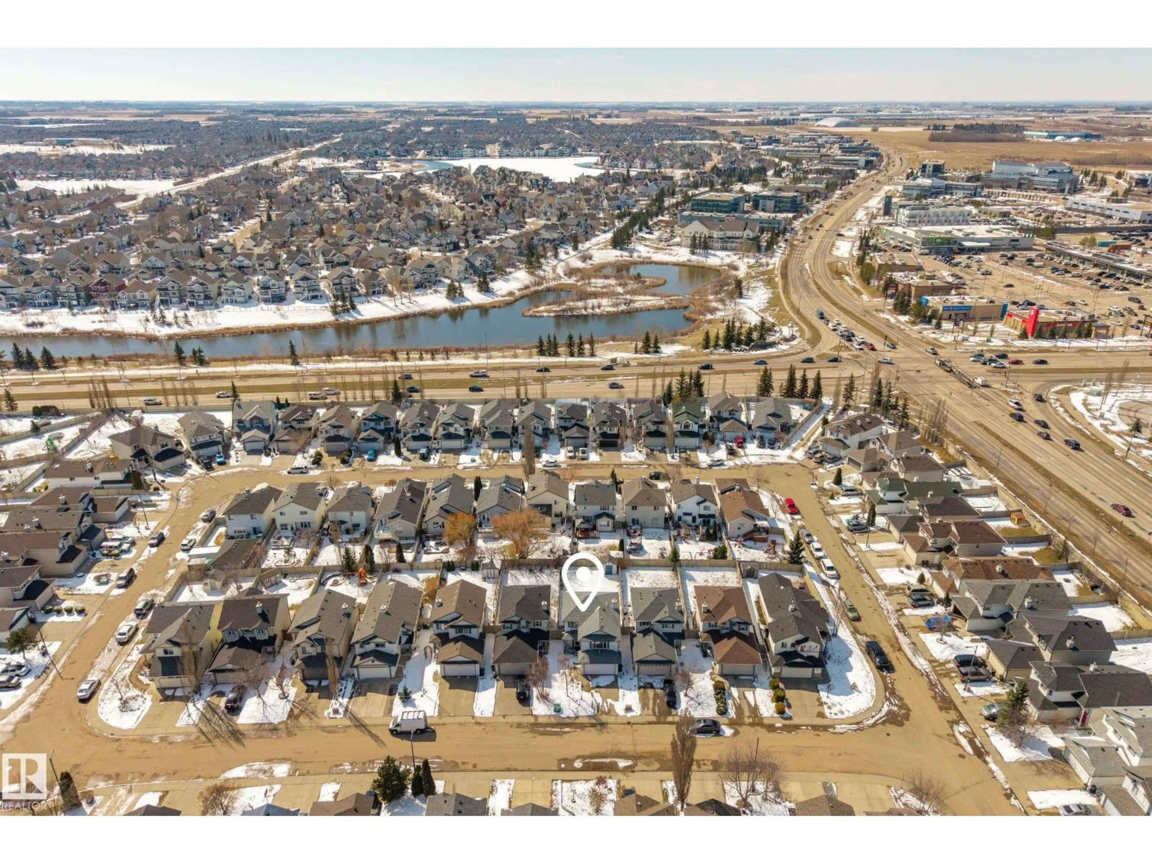 A pic from outside/outdoor area/front of a property/back of a property/a pic from drone, water/lake/river/ocean view for 8915 7 AV, Edmonton Alberta T6X1B7
