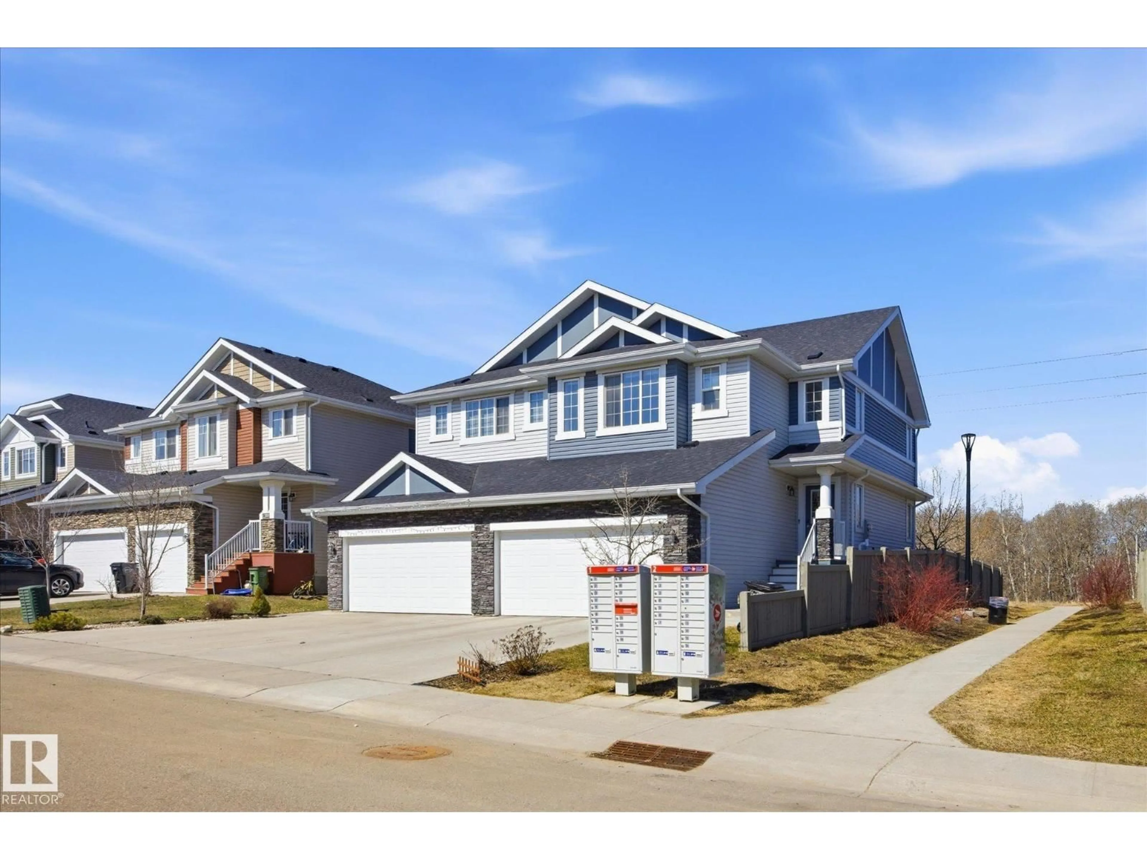 Home with vinyl exterior material, street for 3887 ROBINS CR, Edmonton Alberta T5S0M8