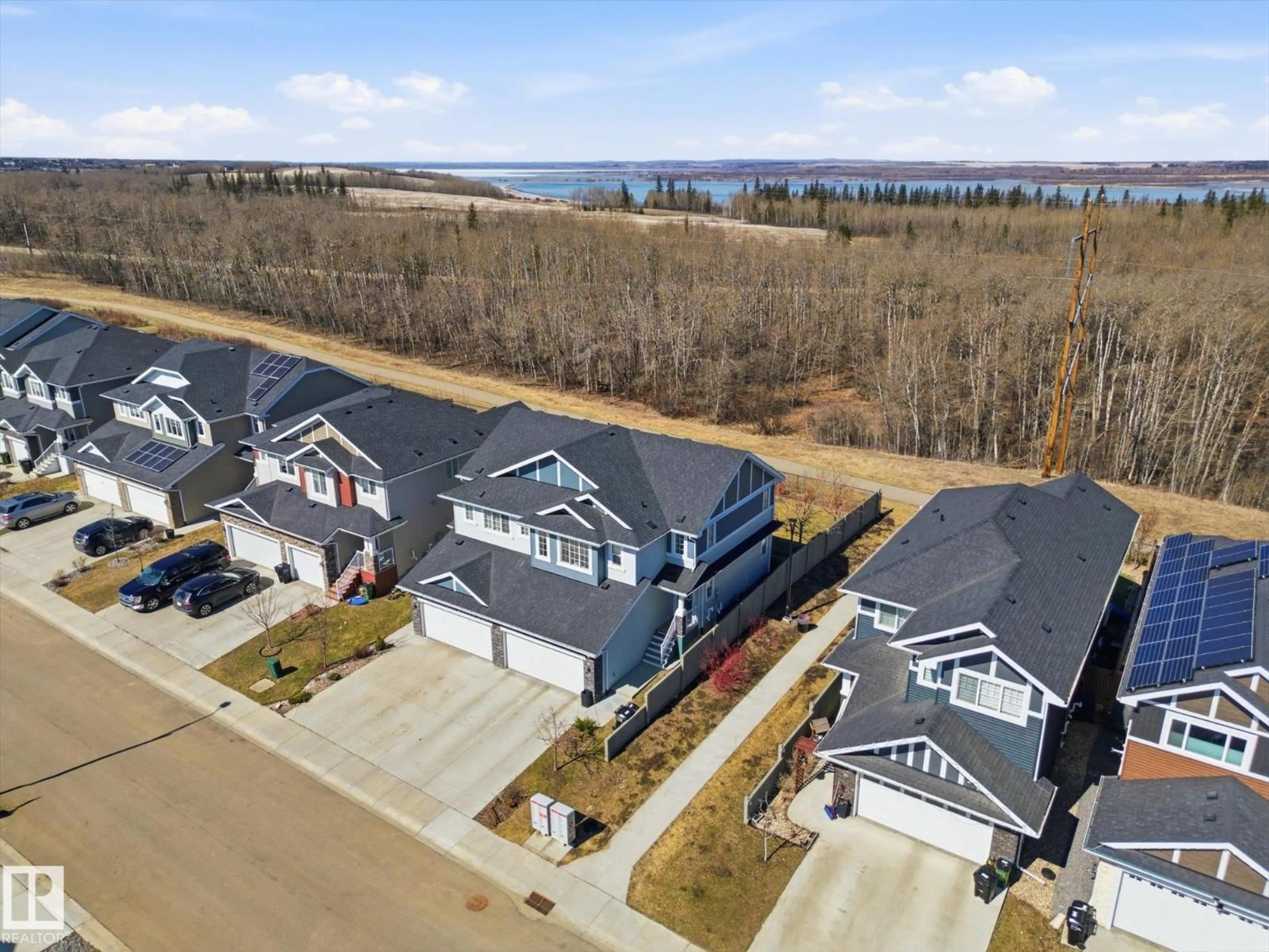 A pic from outside/outdoor area/front of a property/back of a property/a pic from drone, water/lake/river/ocean view for 3887 ROBINS CR, Edmonton Alberta T5S0M8