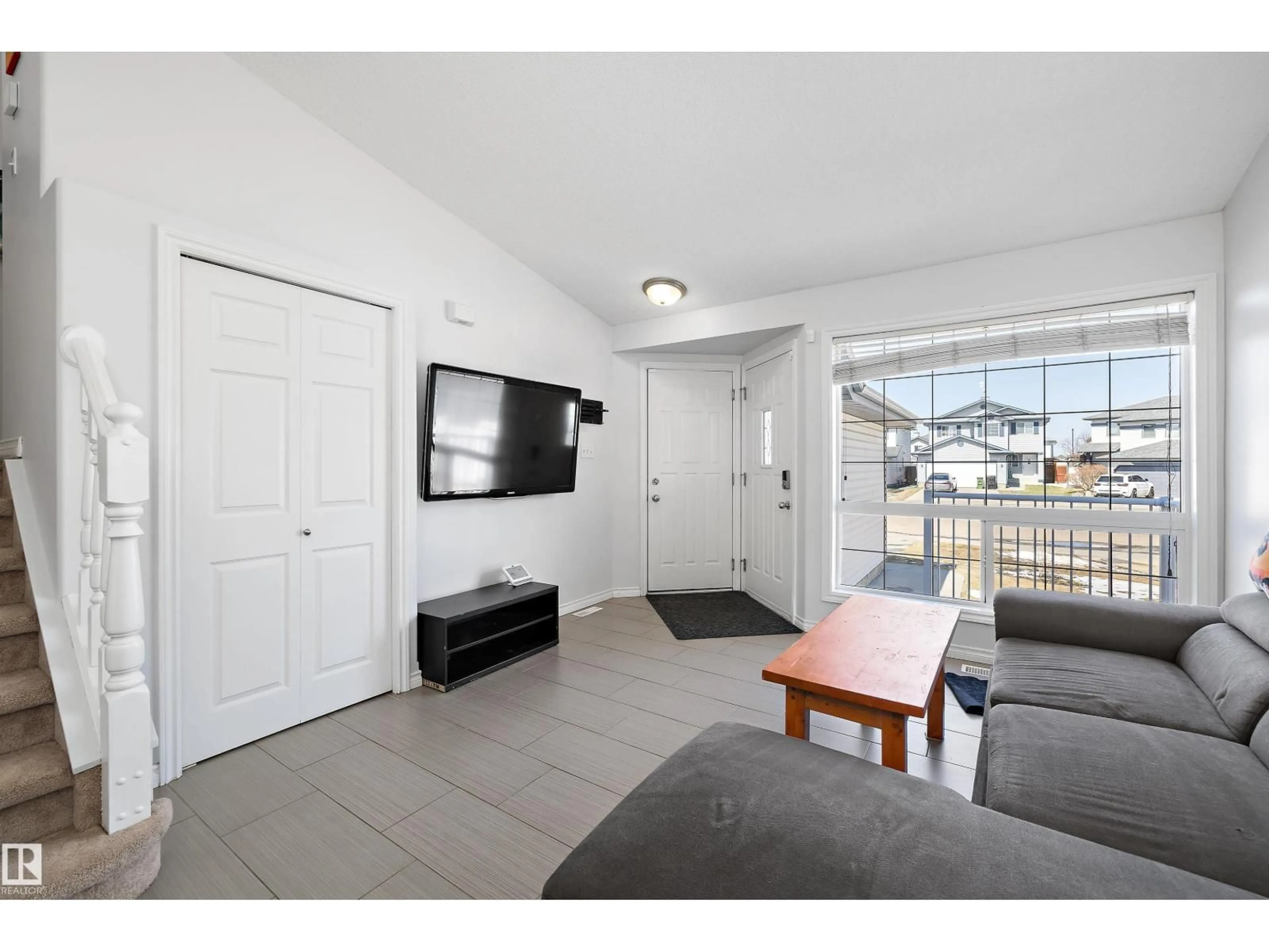 Living room with furniture, unknown for 1811 37 AV, Edmonton Alberta T6T1S6